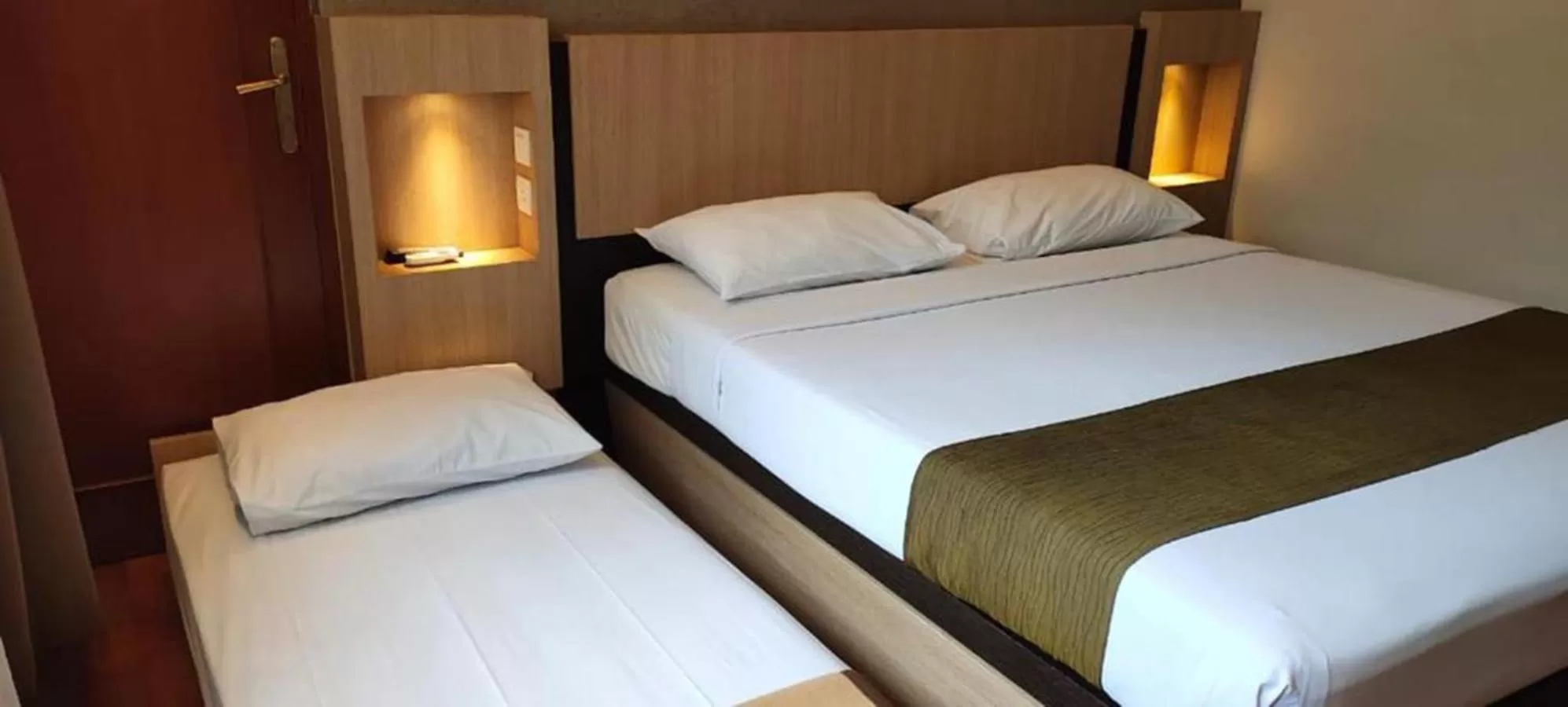 Bed in Sukajadi Hotel, Convention and Gallery