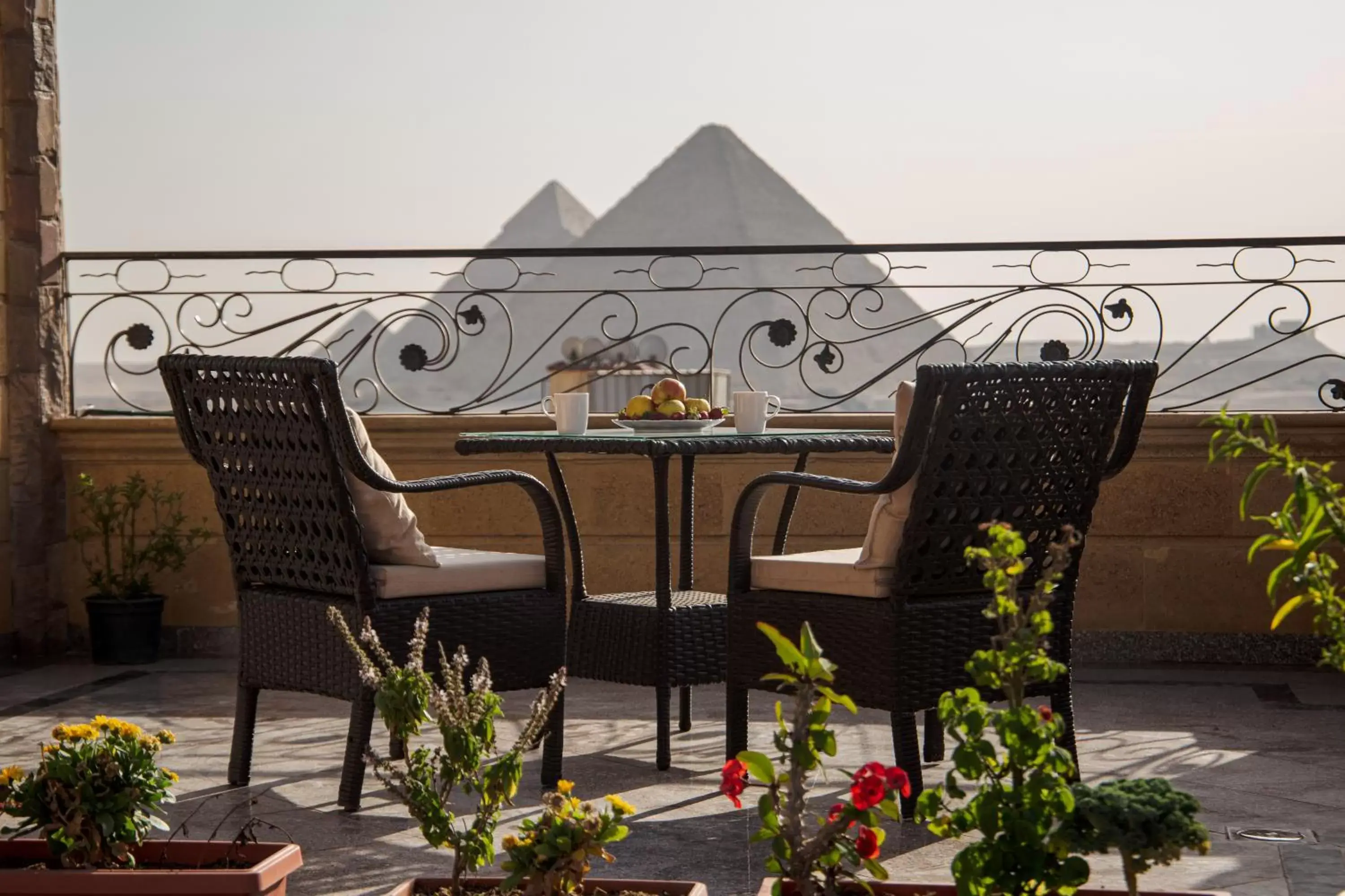 Family Room with Balcony and Pyramids View in Gardenia Inn Hotel Family Room with Balcony and Pyramids View in Gardenia Inn Hotel