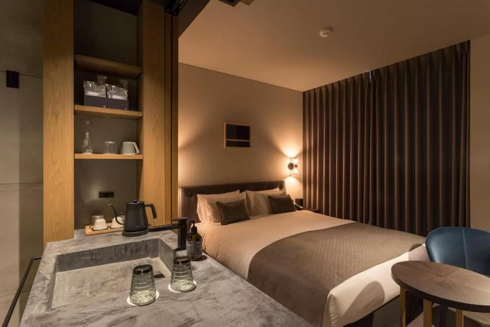 Bed in HOTEL CANATA KYOTO