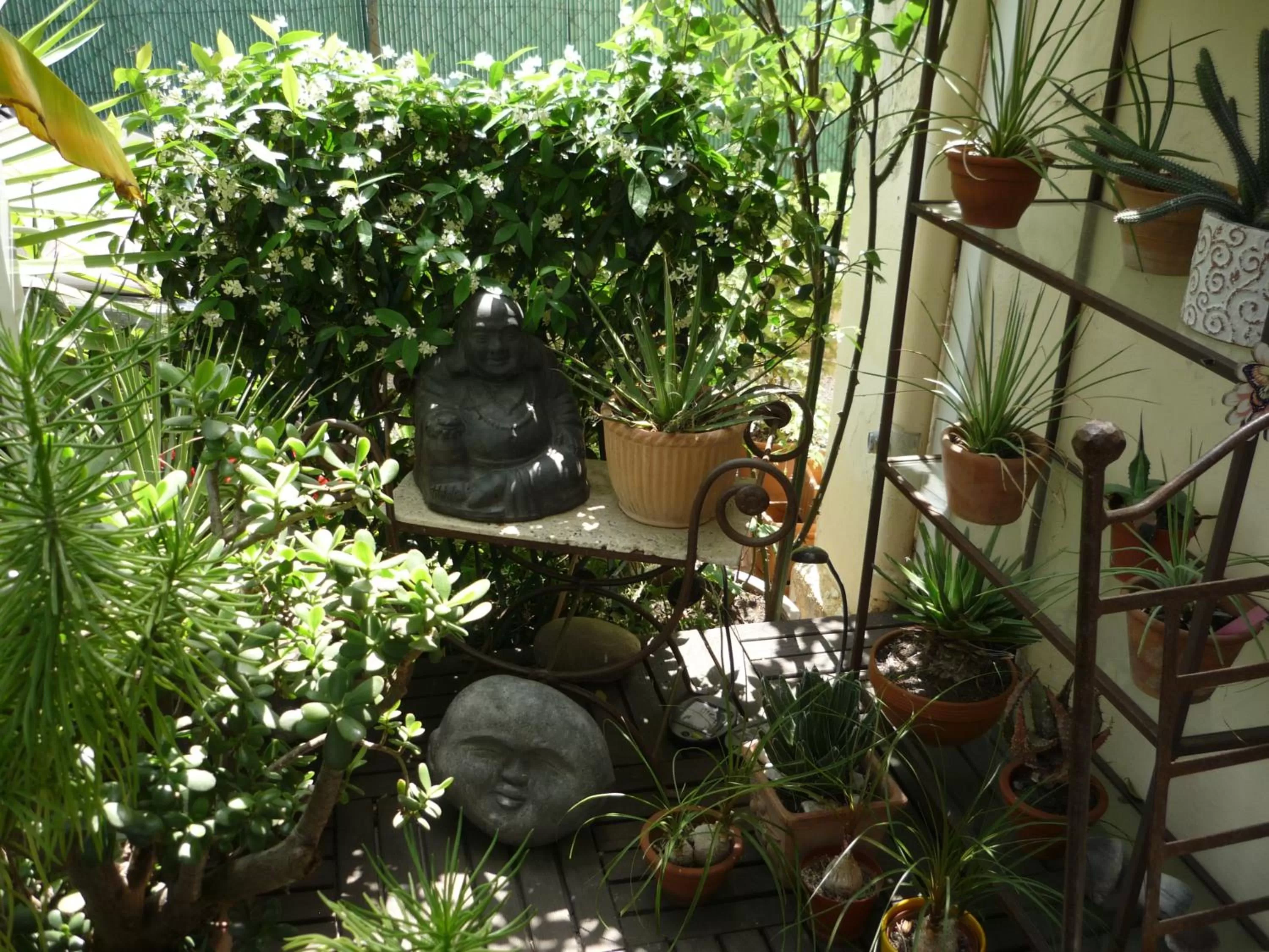 Garden in Logis Hôtel Villa Victorine