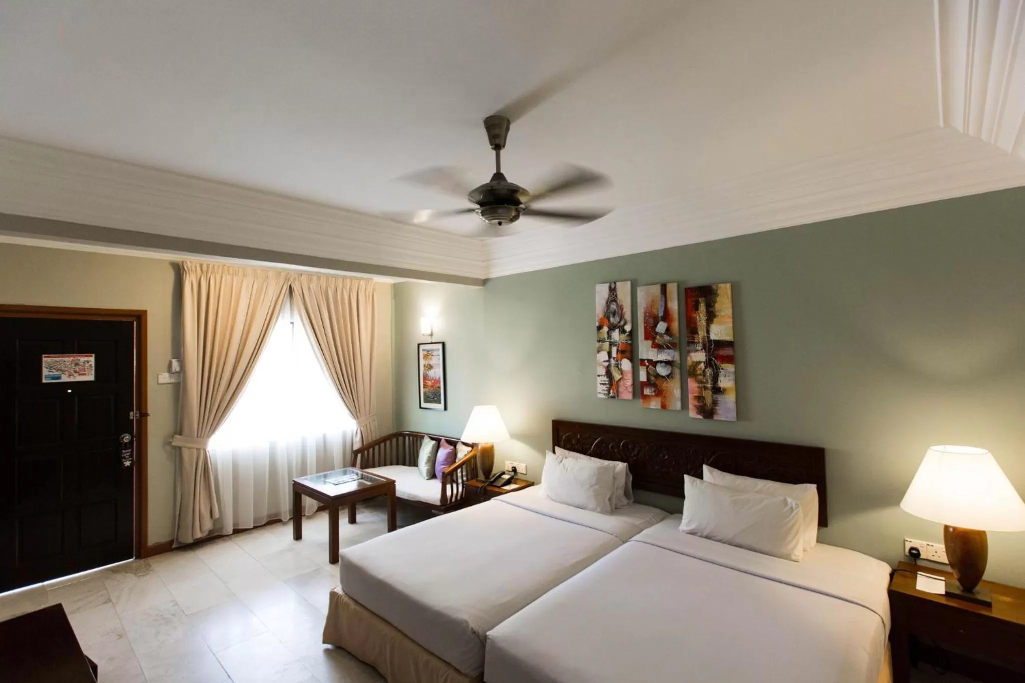 Bed in Frangipani Langkawi Resort