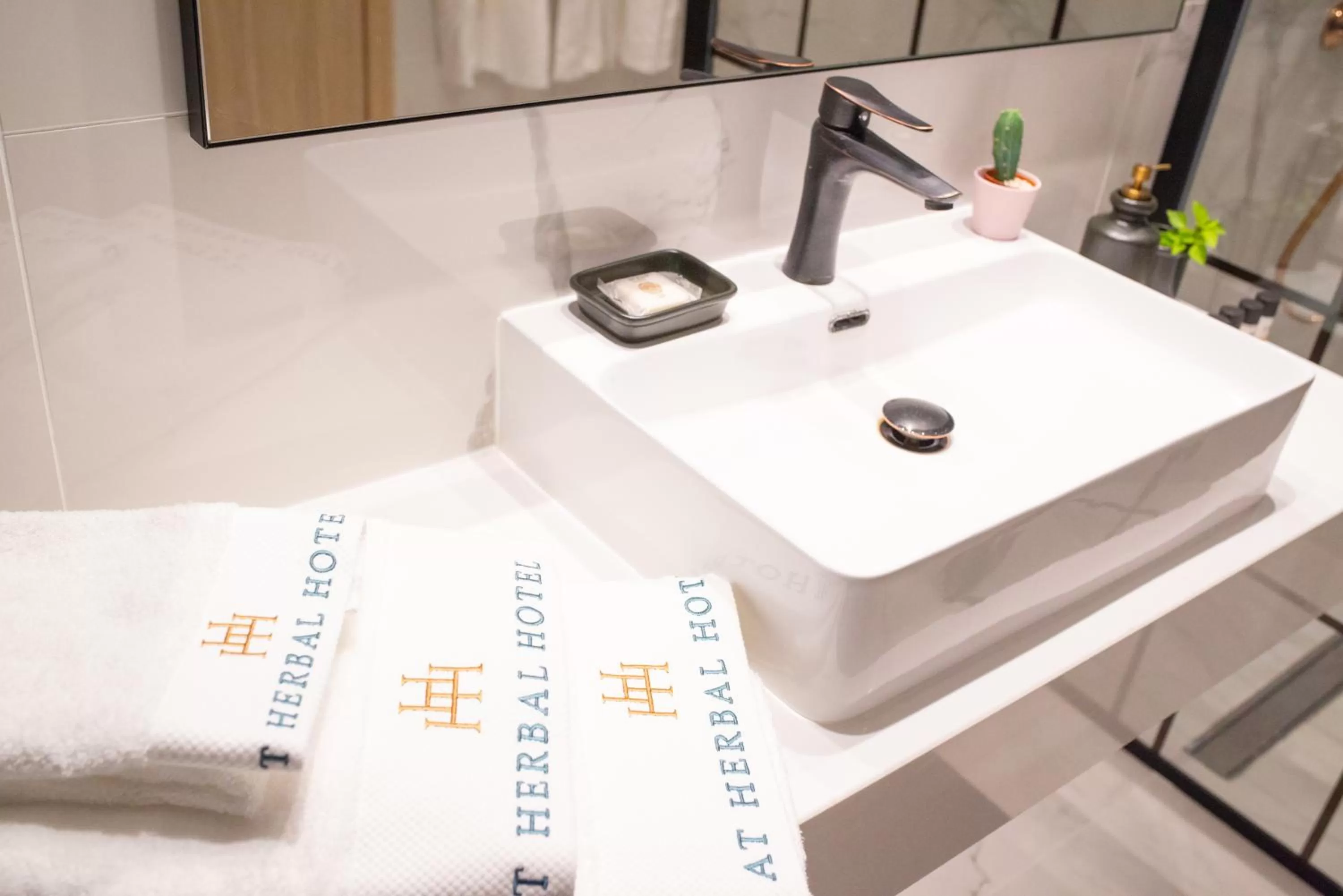 Bathroom in At Herbal Boutique Hotel & Spa