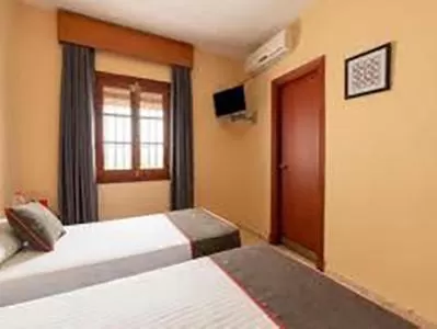 Bed in HOSTAL-RESTAURANTE EL PAISANO