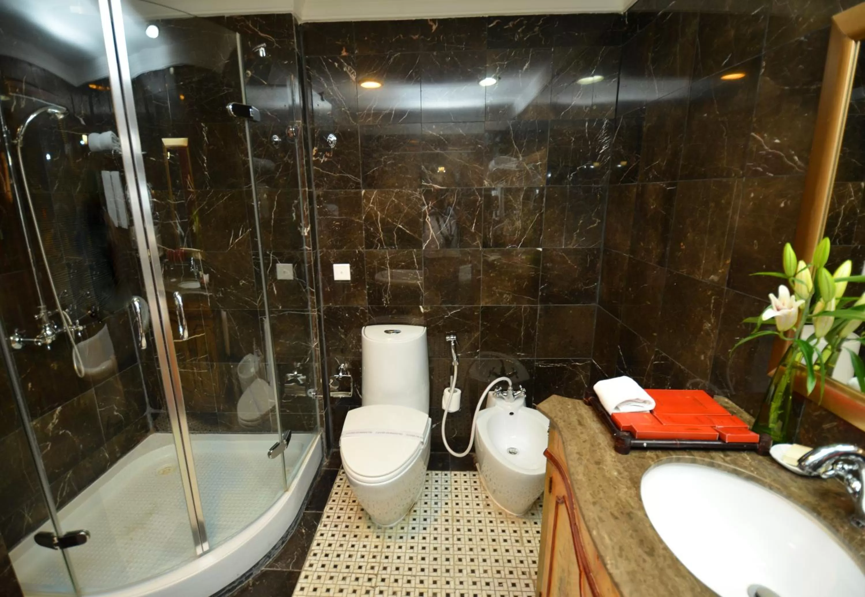 Toilet in The Convention Center & Royal Suites Hotel