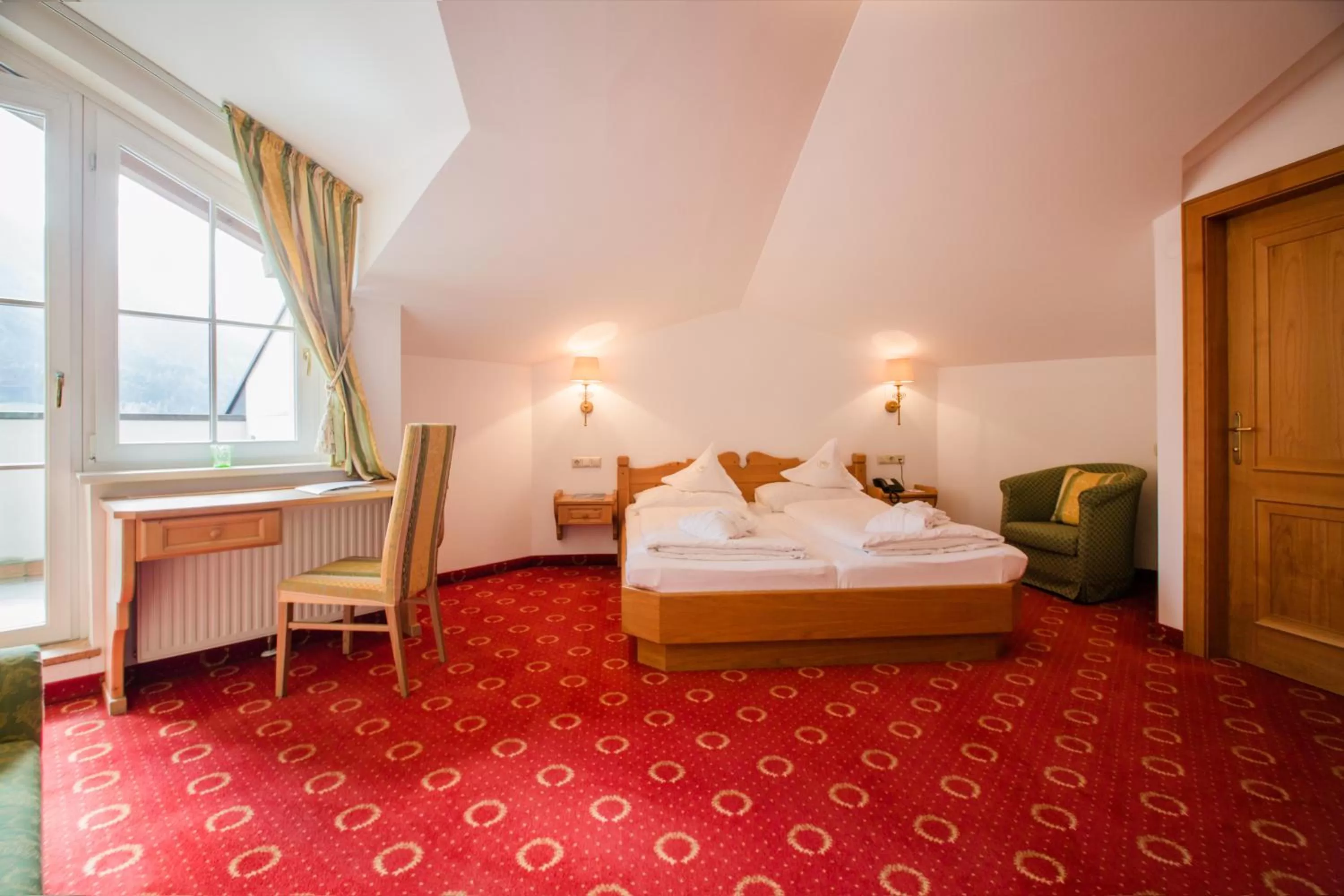 Photo of the whole room, Bed in Hotel AlpenSchlössl