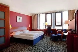 Photo of the whole room, Bed in Vienna House by Wyndham Sonne Rostock