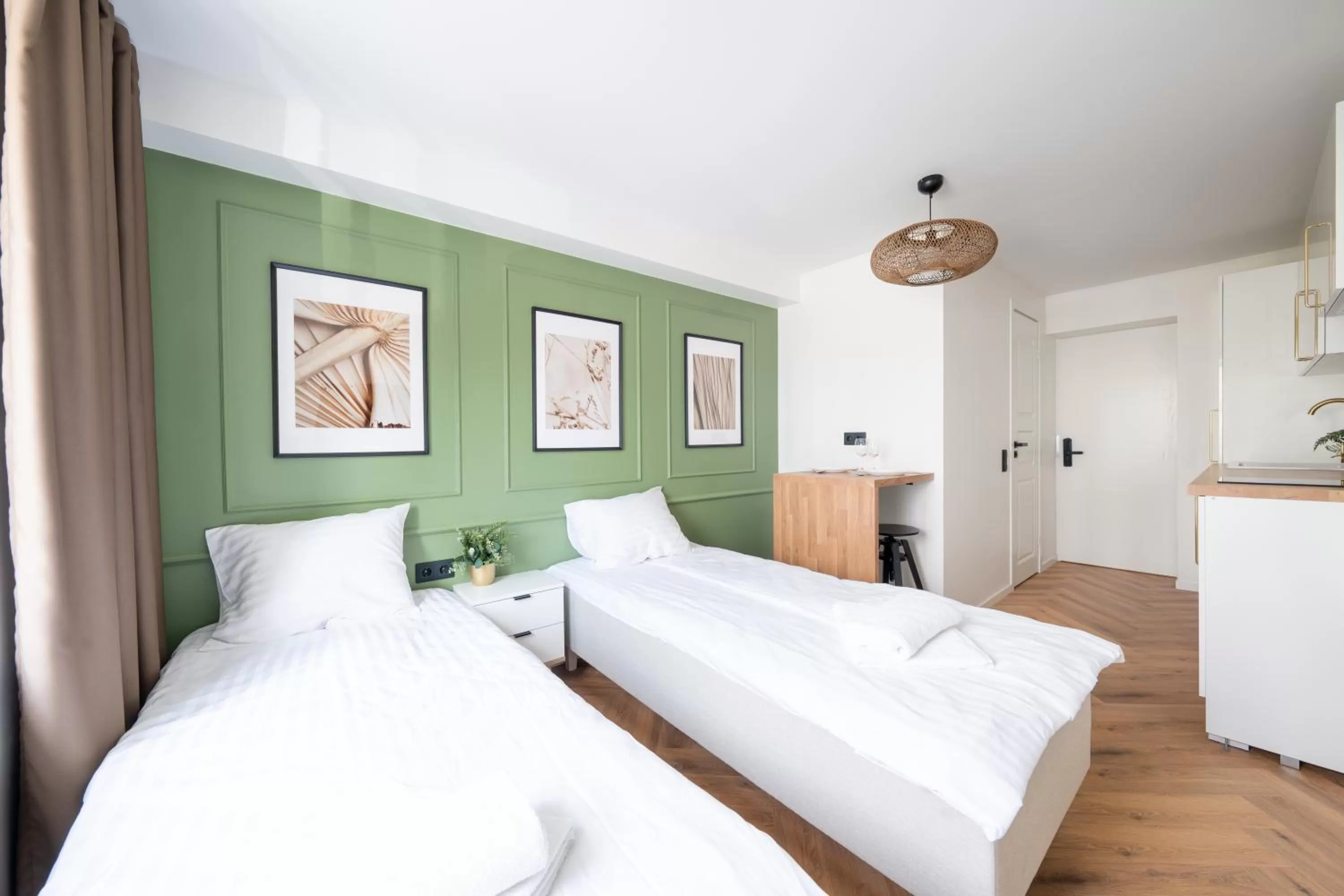 Bed in Oasis Airport Studios by RevalHome