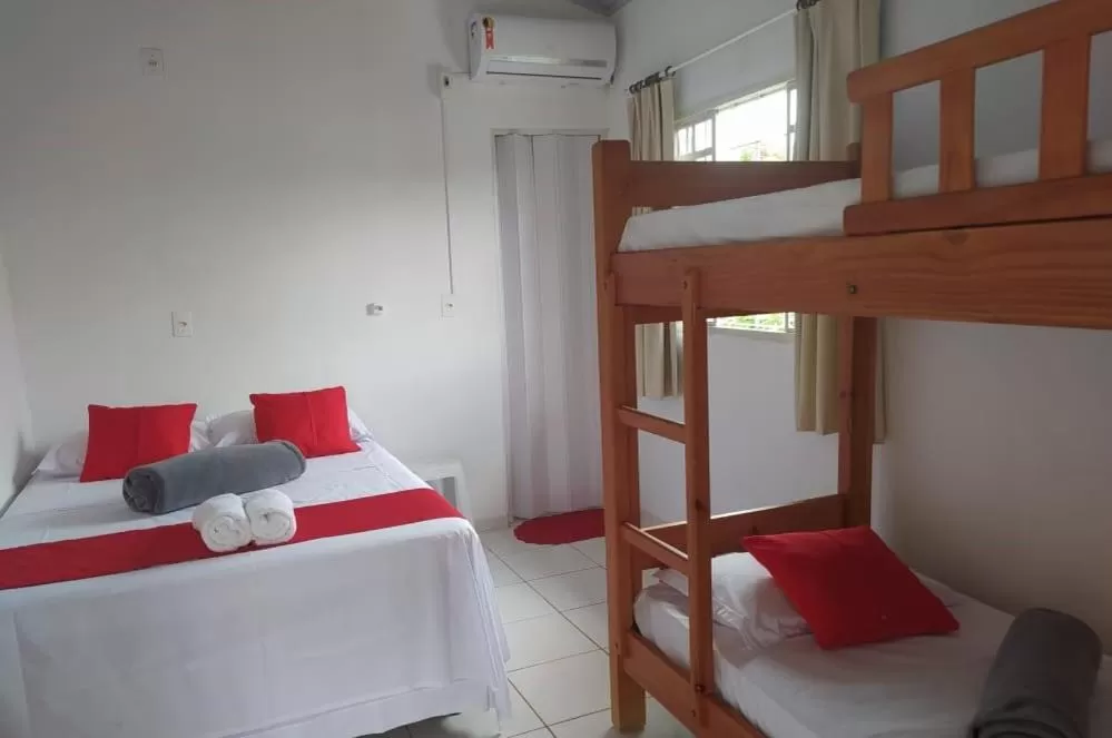 Bed in Pousada Aquarela Pirenopolis