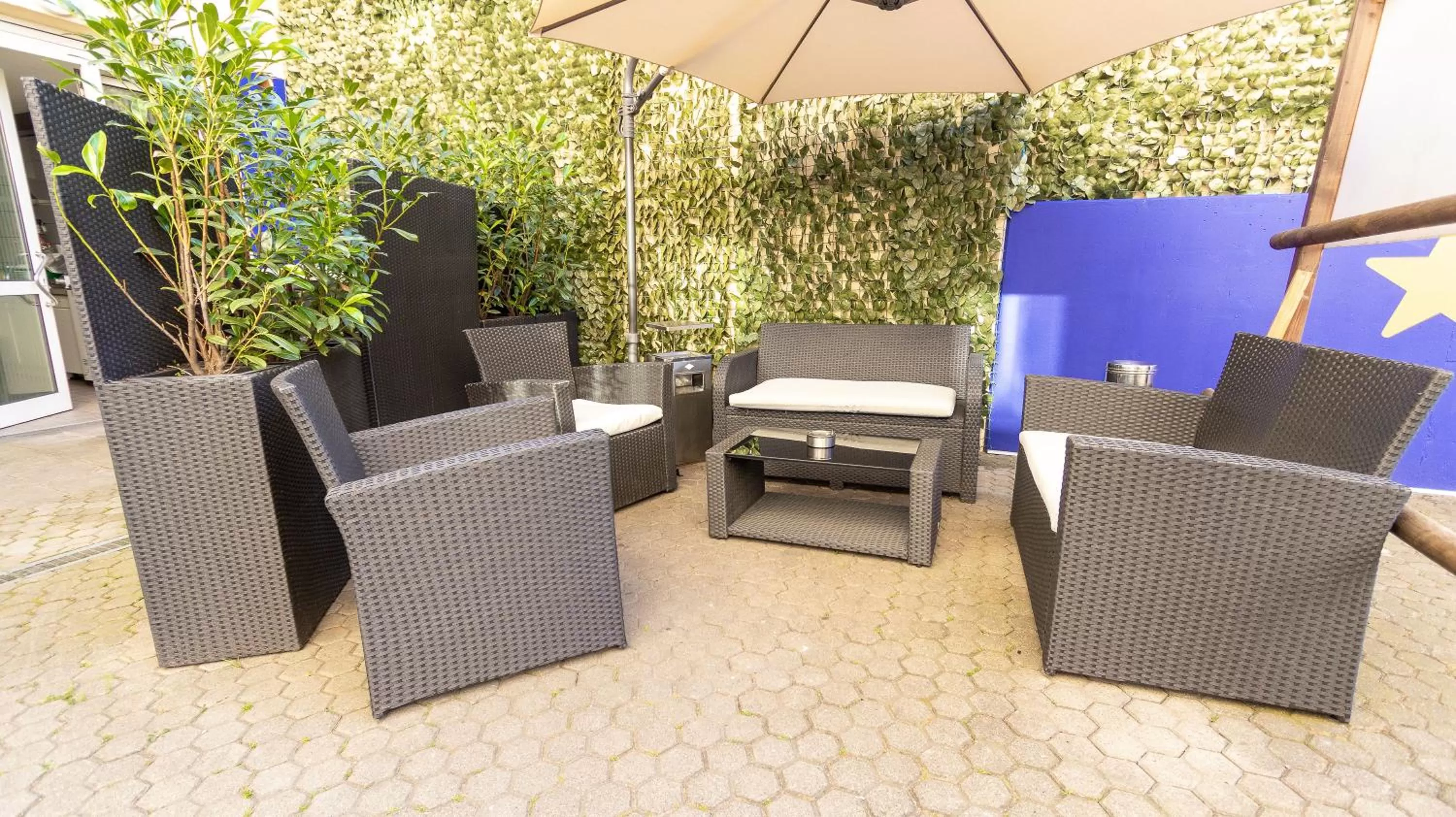 Seating area, Patio/Outdoor Area in LeoMar Hotel