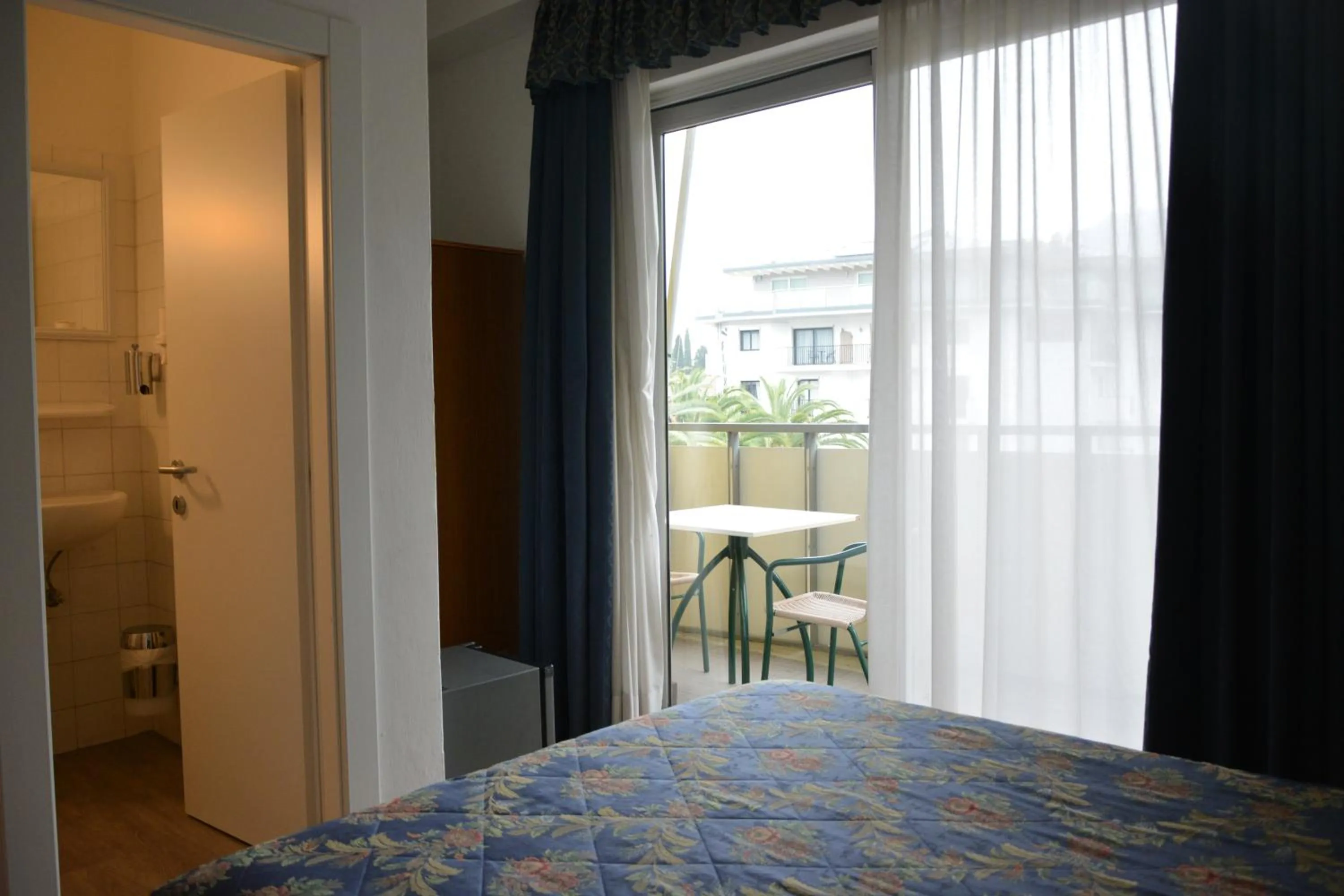 Bedroom, Bed in Hotel Primo