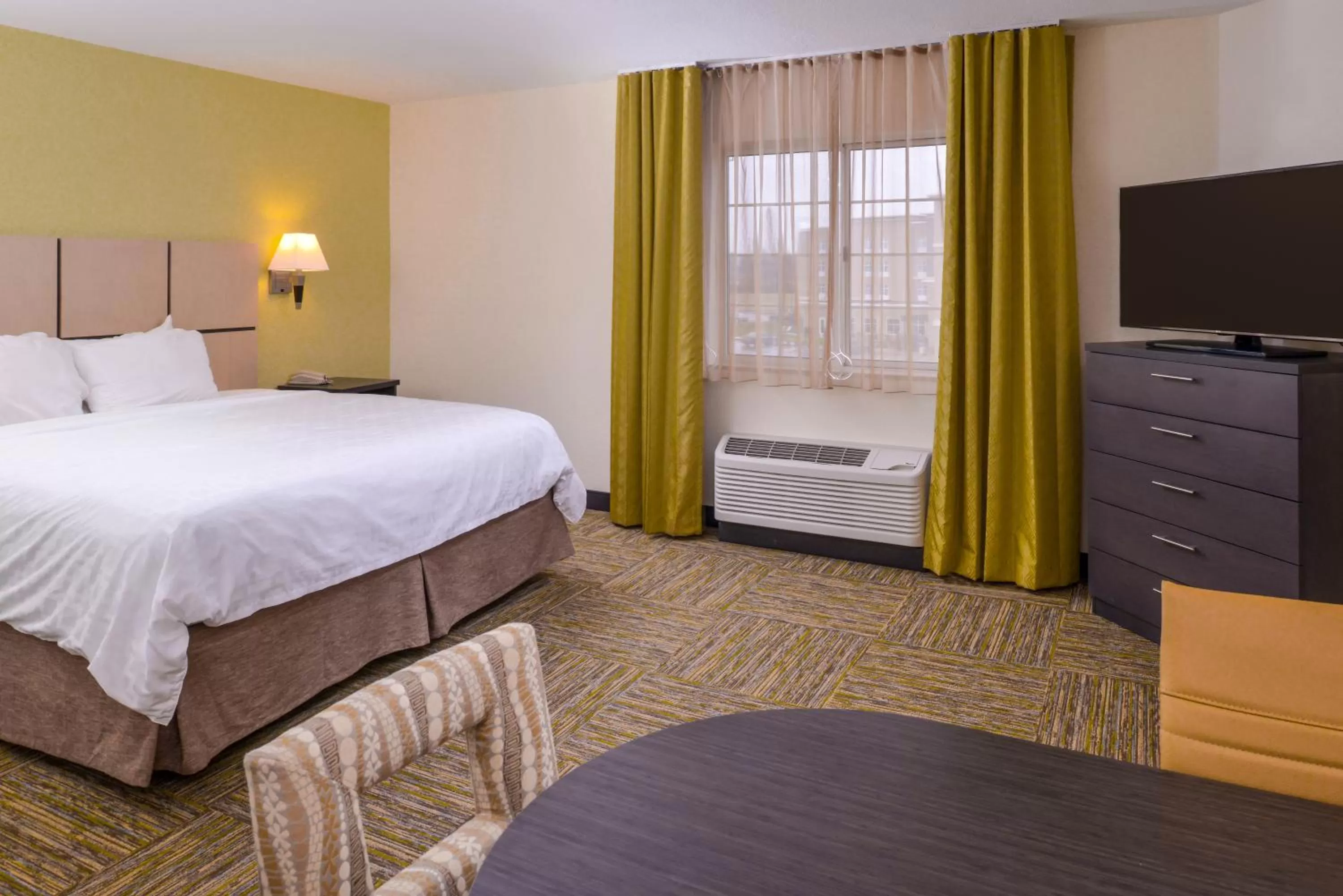 Bed in Candlewood Suites Paducah by IHG