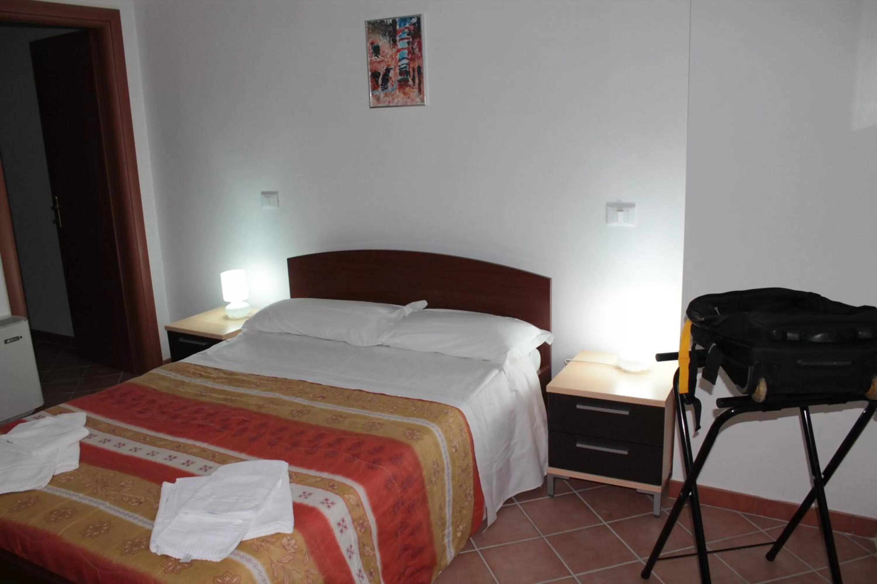 Photo of the whole room, Bed in Residence Sol Levante