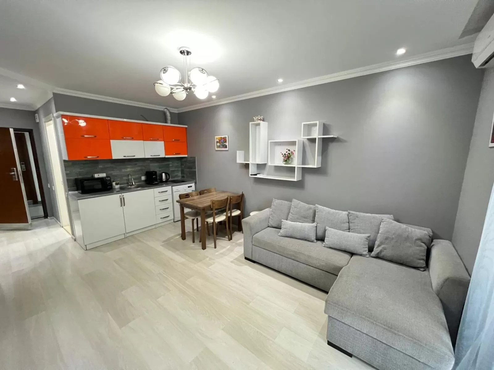 Living room, Kitchen/Kitchenette in Aparthotel Holiday Lux Batumi