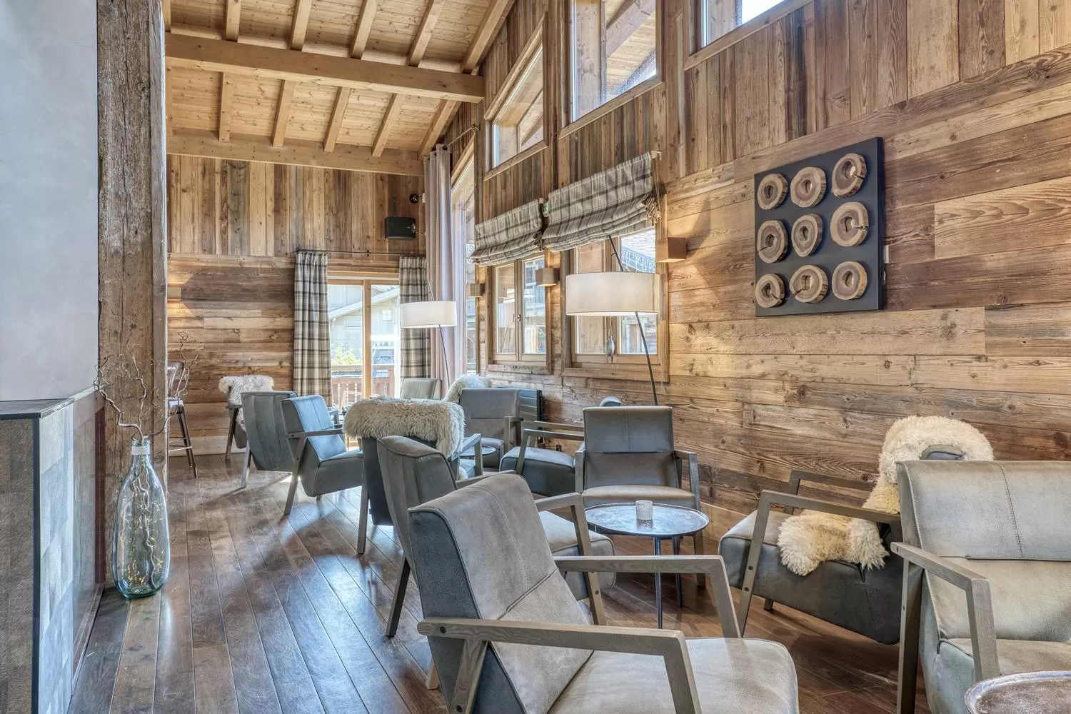 Lounge or bar in Les Loges Blanches Megève