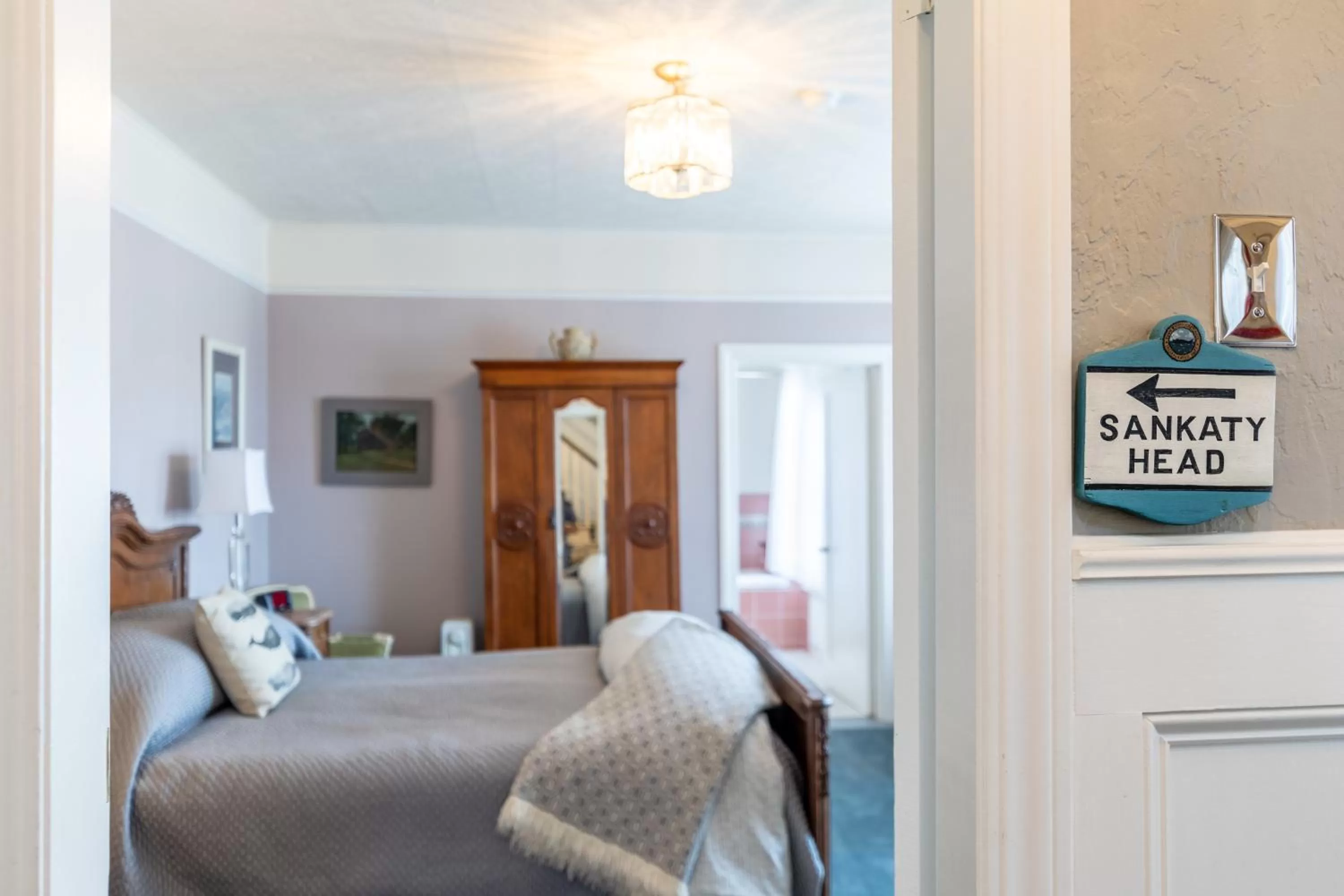 Bed in Nantucket Whale Inn, Half Moon Bay