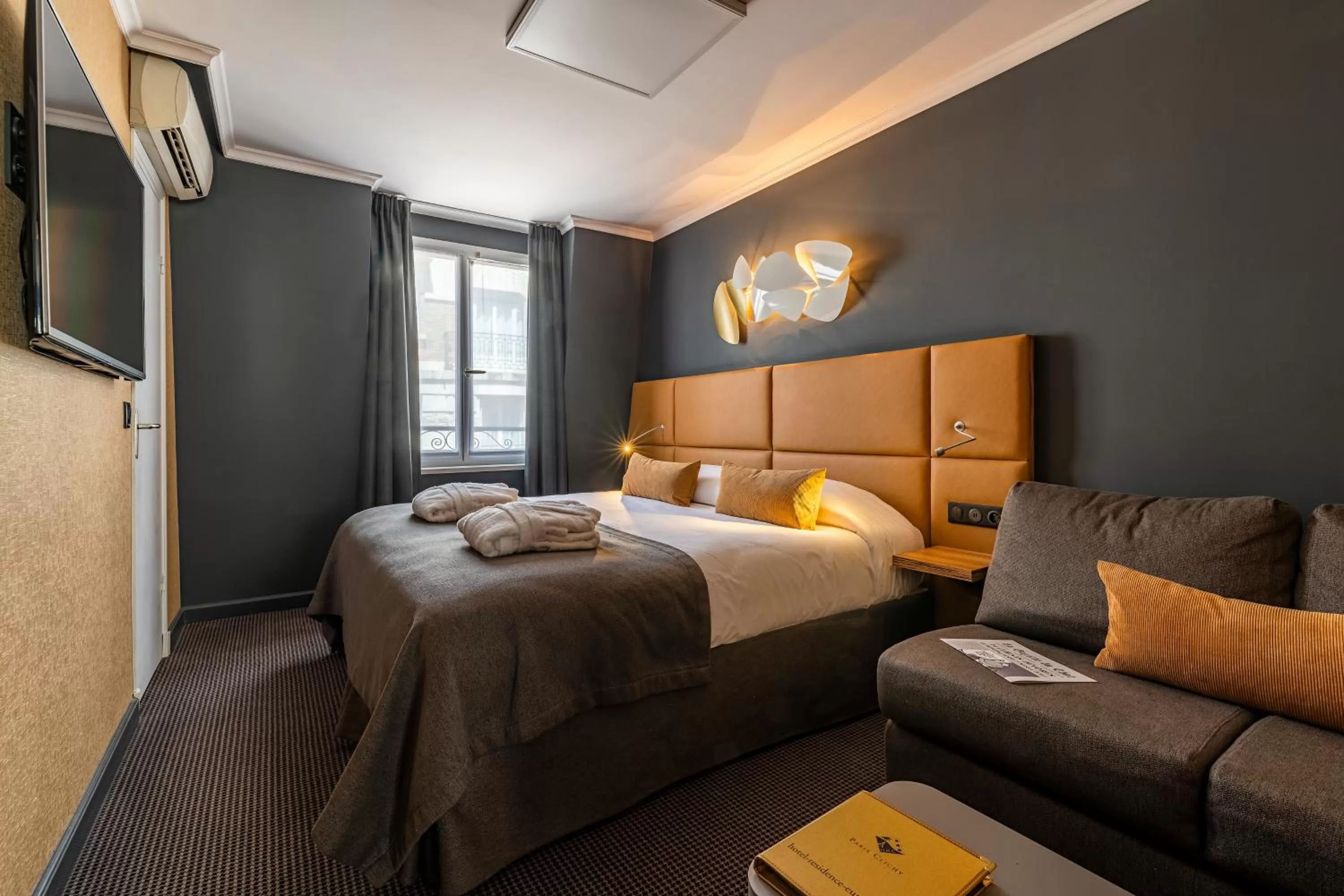 Seating area, Bed in Hotel Residence Europe & Spa