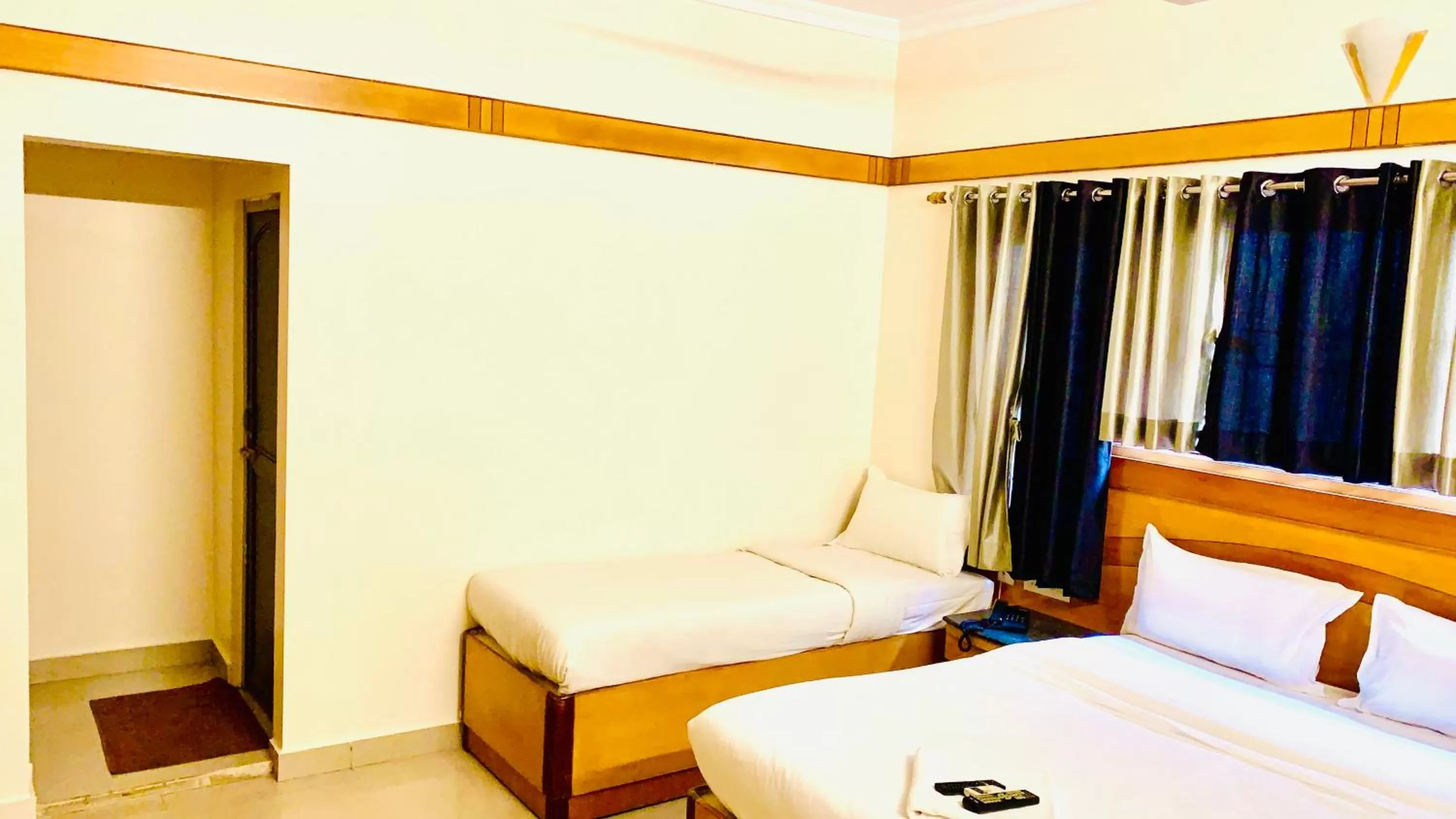 Bed in Half Moon Palace Chennai