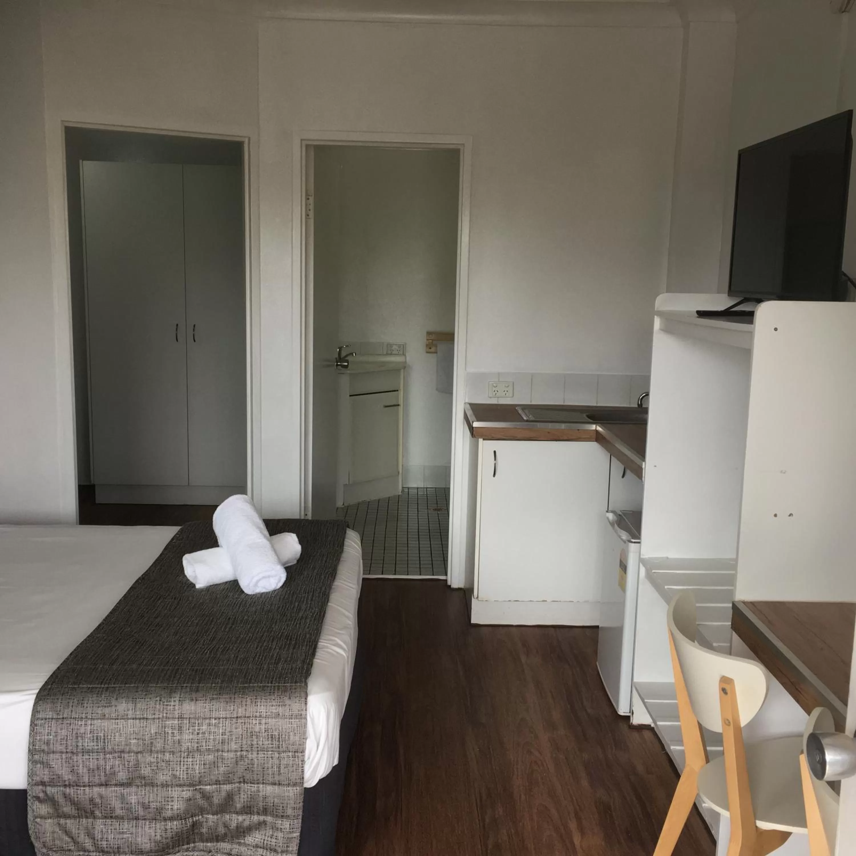 Bed in Blue Pelican Motel