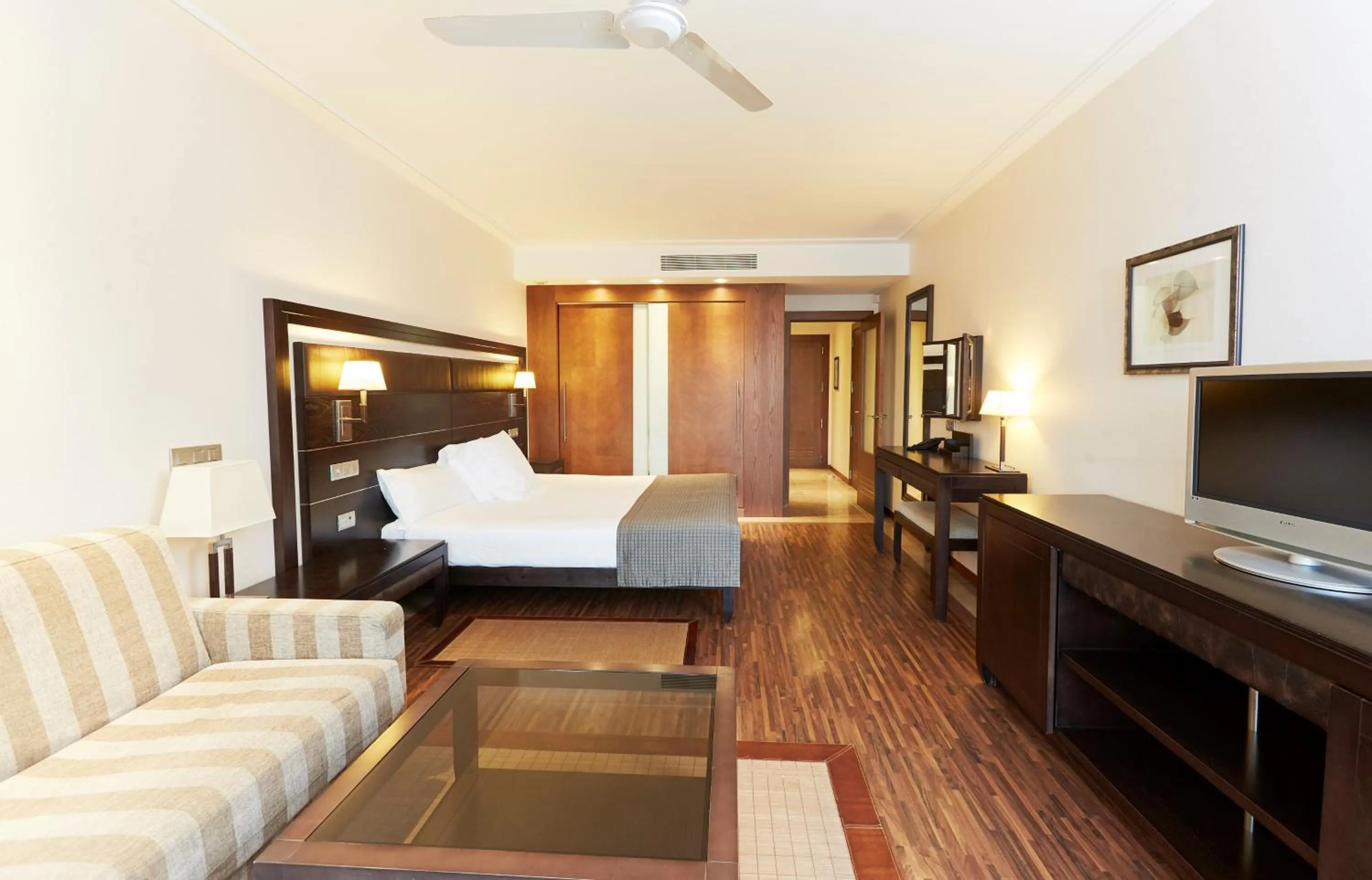 Photo of the whole room, Bed in Insotel Fenicia Prestige Suites & Spa