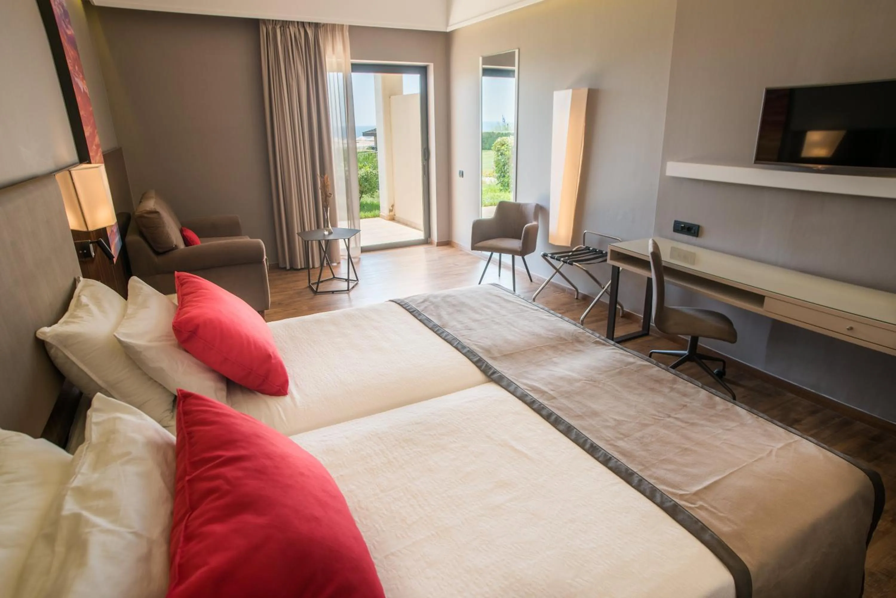 Photo of the whole room, Bed in Ramada Plaza by Wyndham Thraki