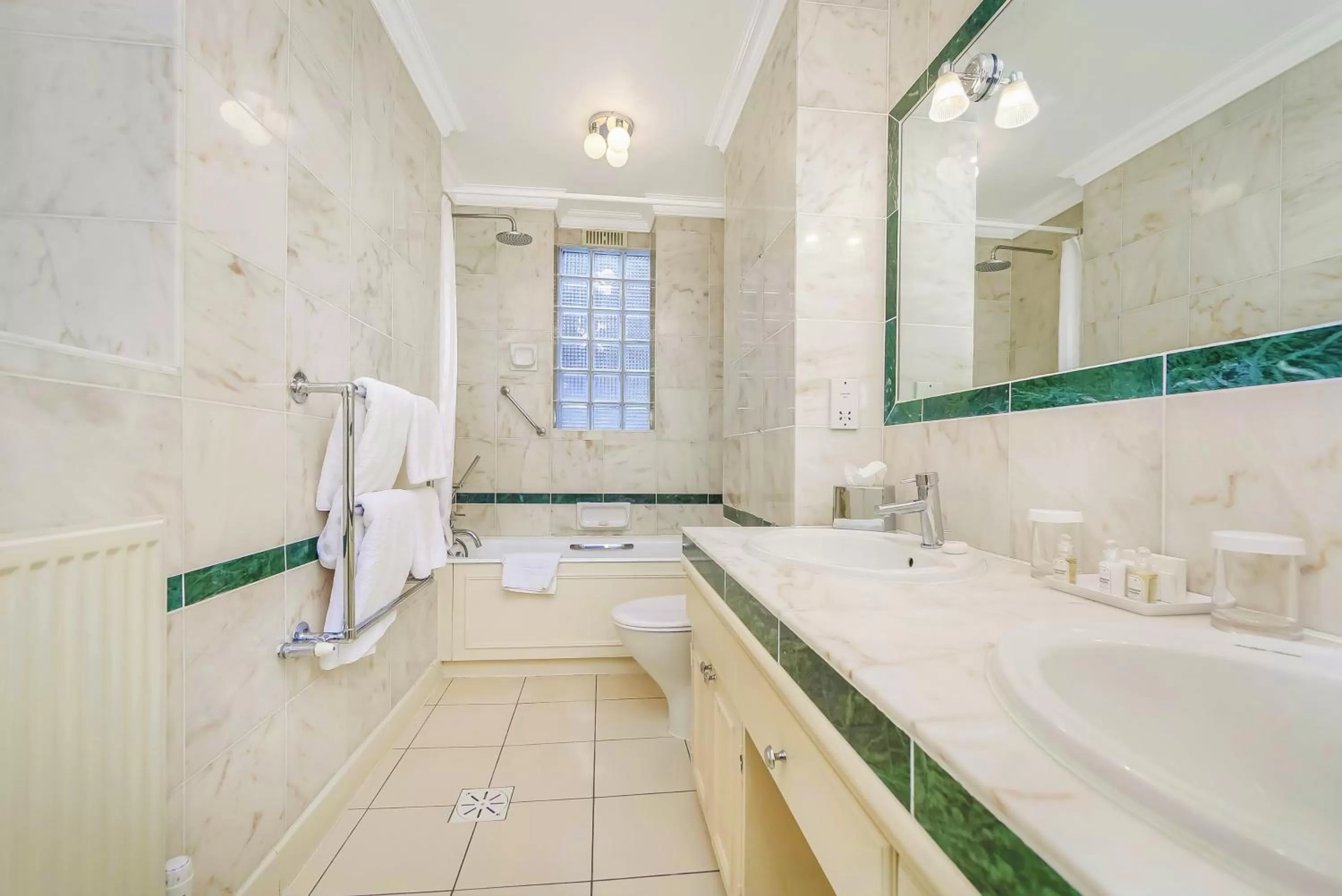 Bathroom in 44 Curzon Street by Mansley