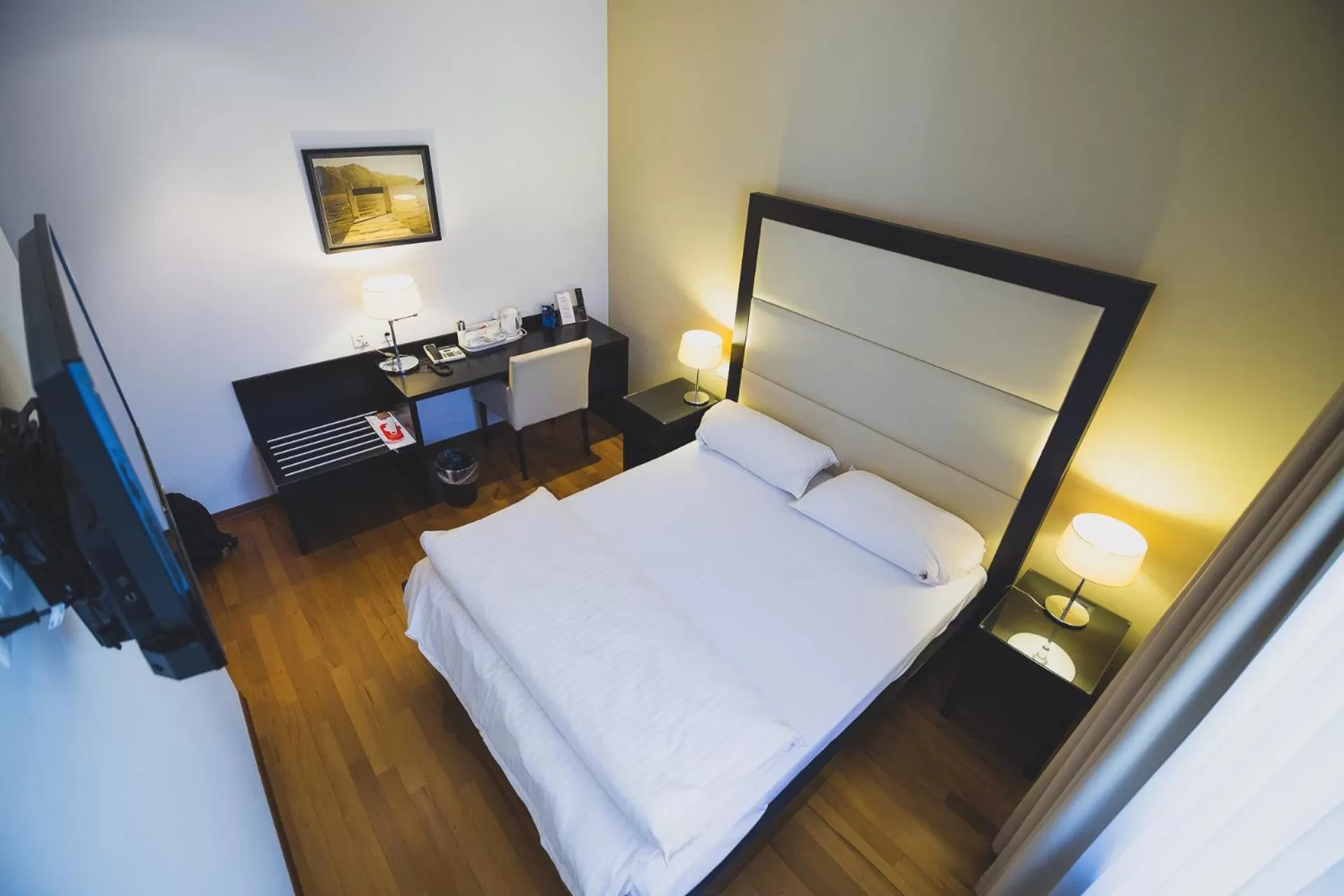 Bed in Enjoy 1313AG Hotel Touring