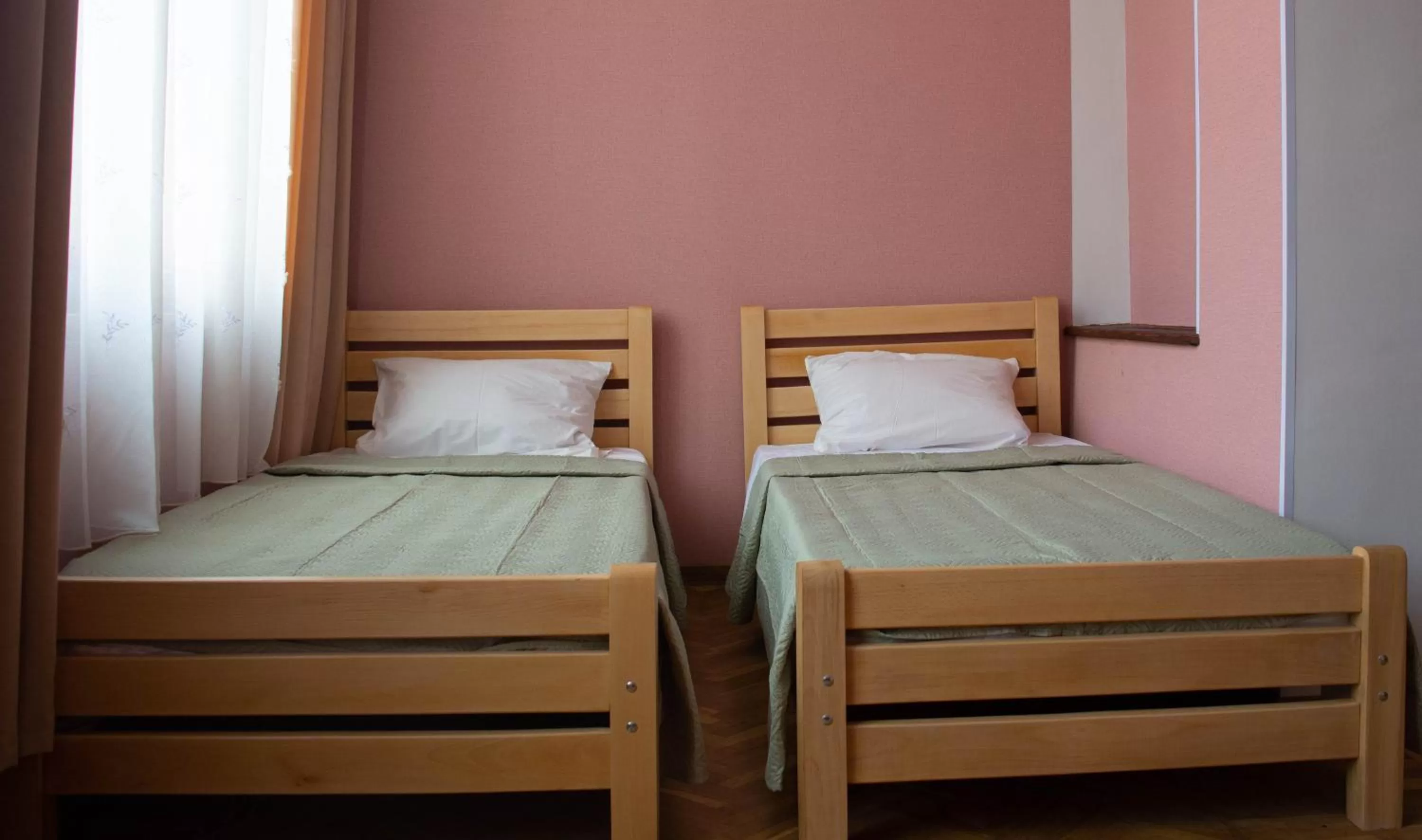 Bed in Sunflower Hotel