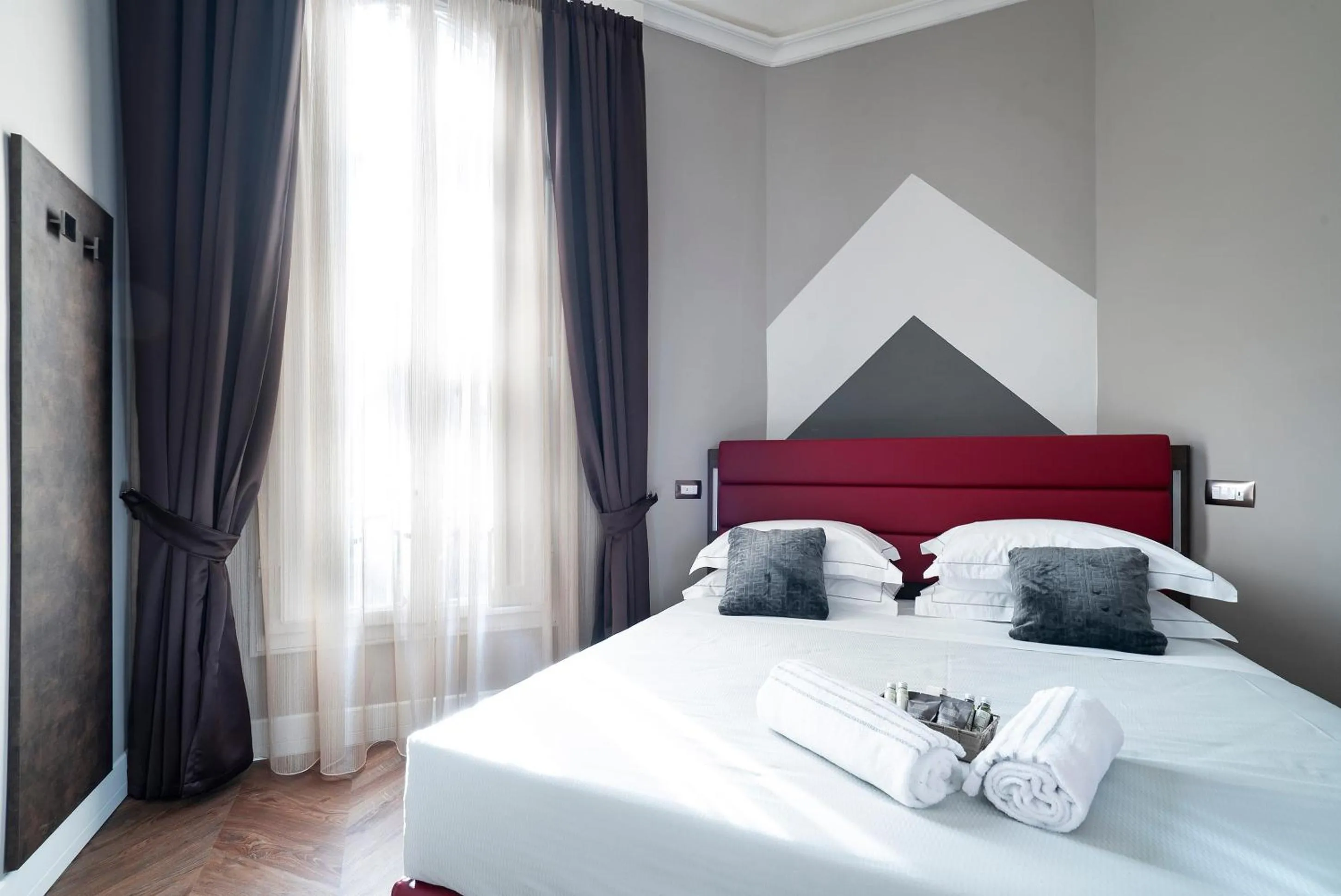 Bed in Artemide Guest House