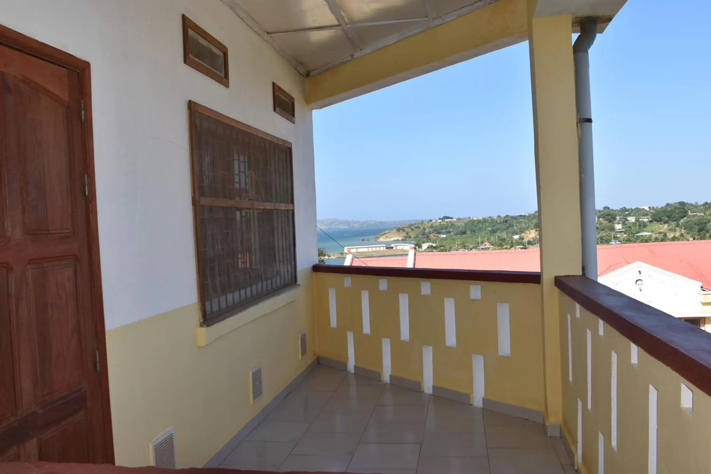 Double Room with Balcony and Sea View in Centre Lucien Botovasoa Double Room with Balcony and Sea View in Centre Lucien Botovasoa