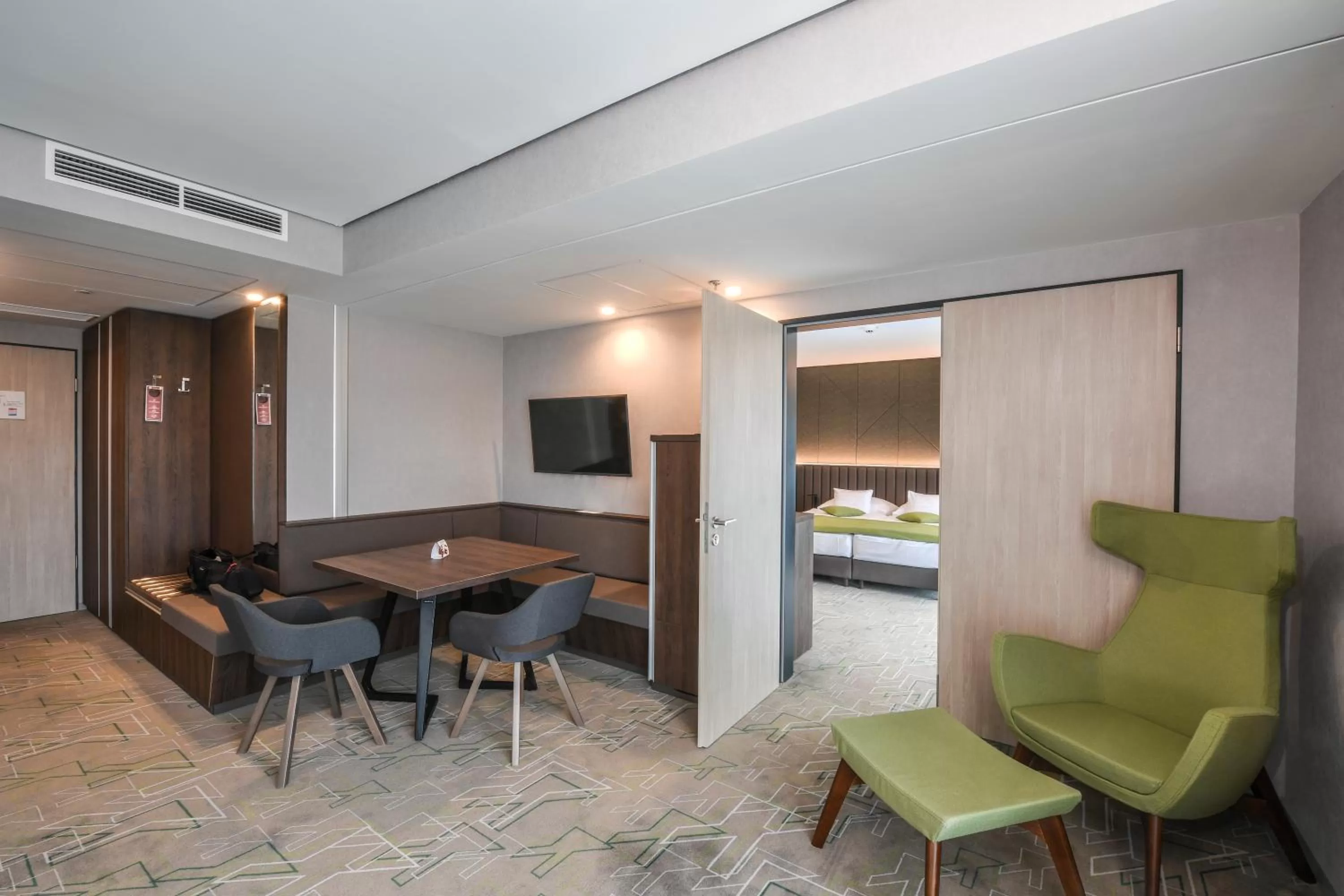 Living room, Bed in Hunguest Hotel Sóstó