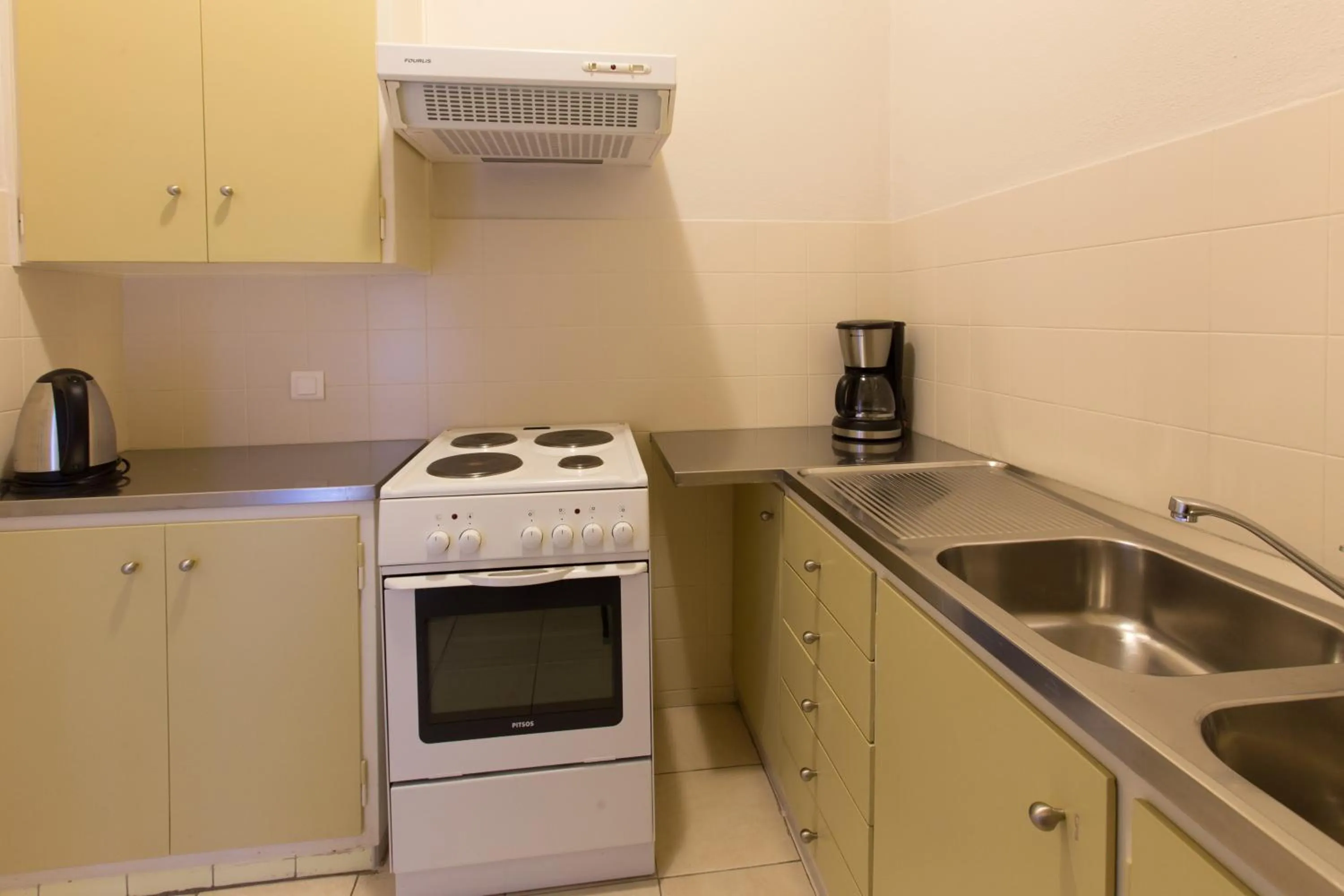 Kitchen or kitchenette in Delice Hotel - Family Apartments