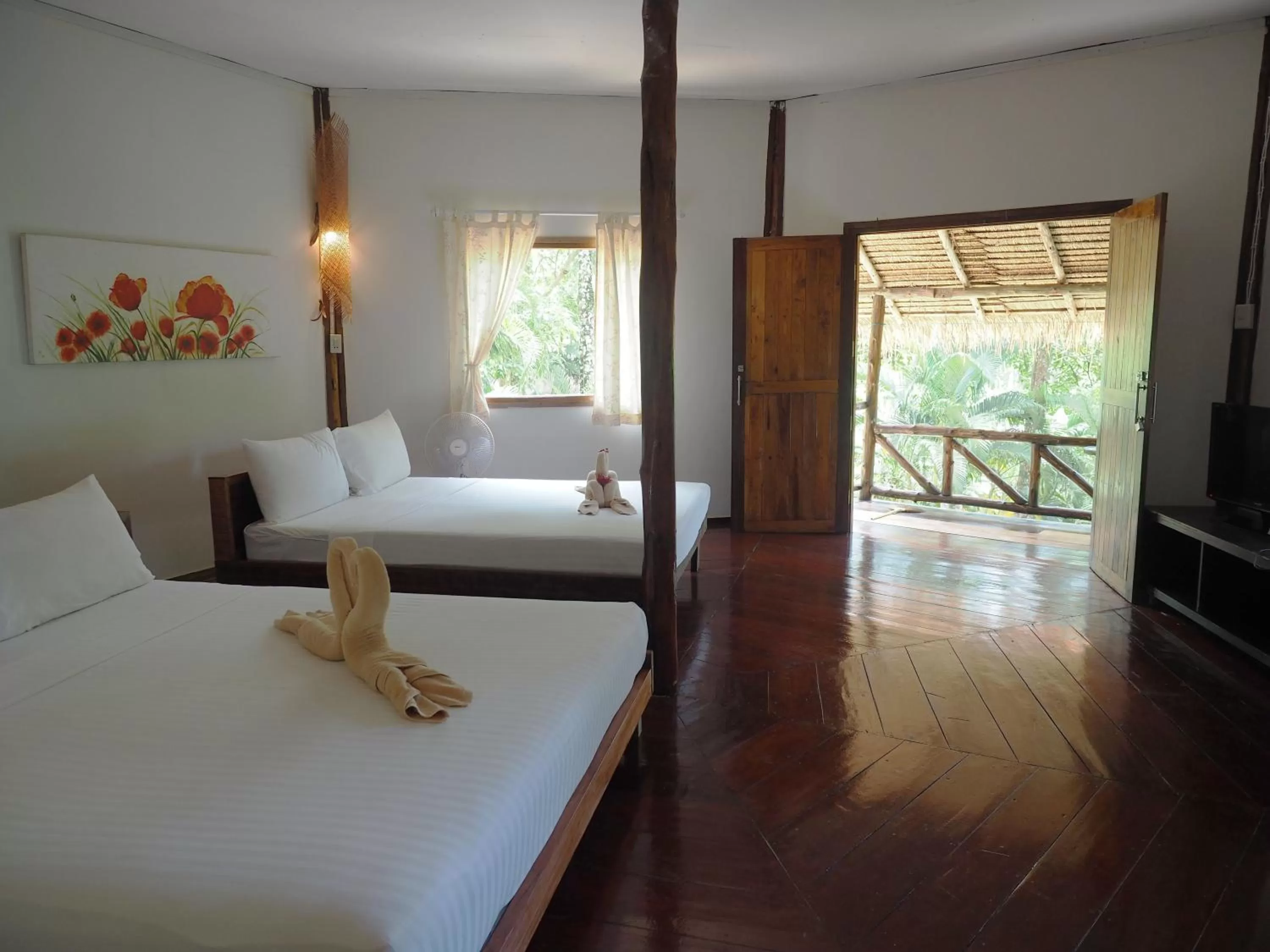 Bed in LITTLE EDEN Bungalows