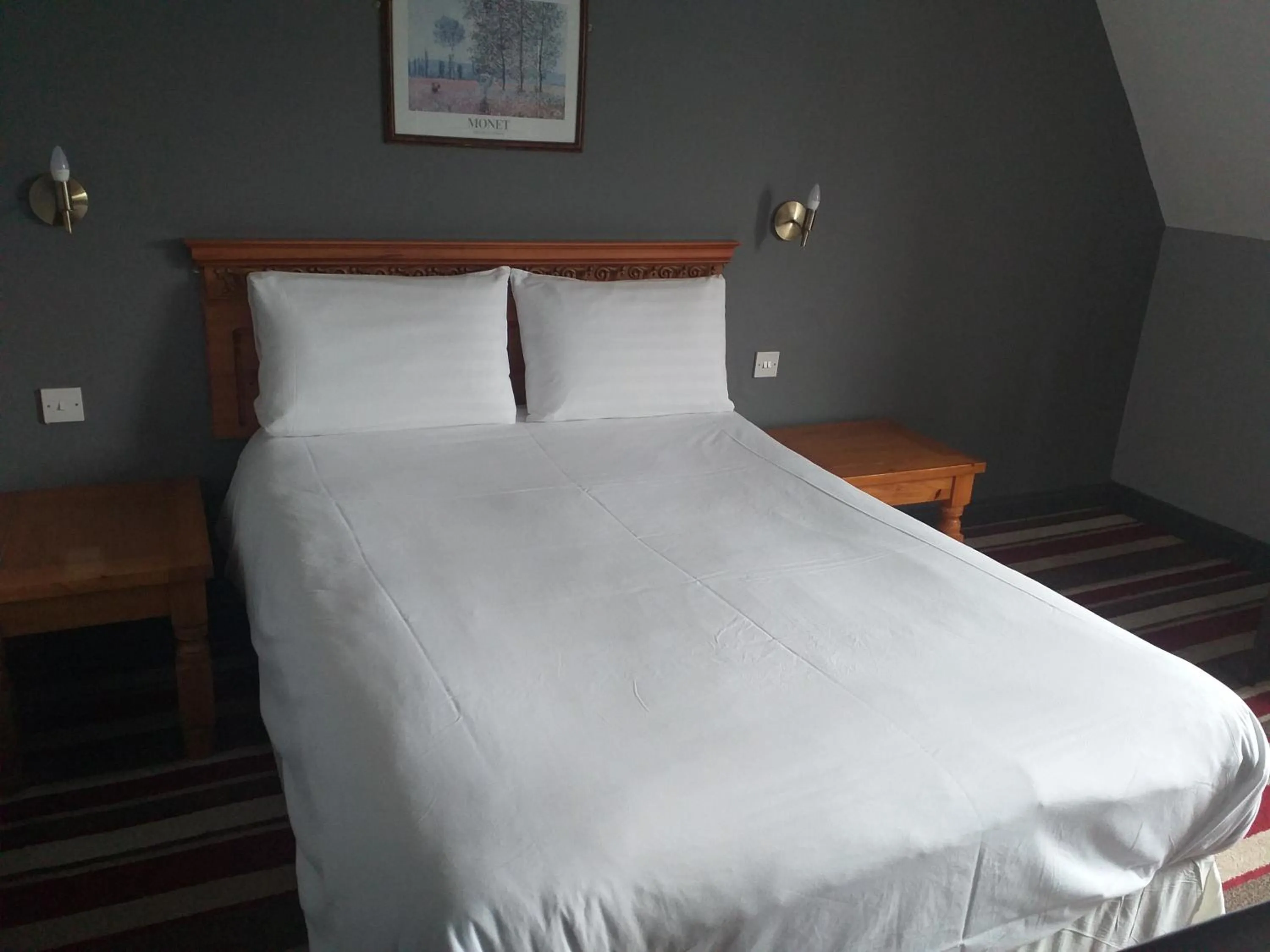 Bed in The Airman Hotel