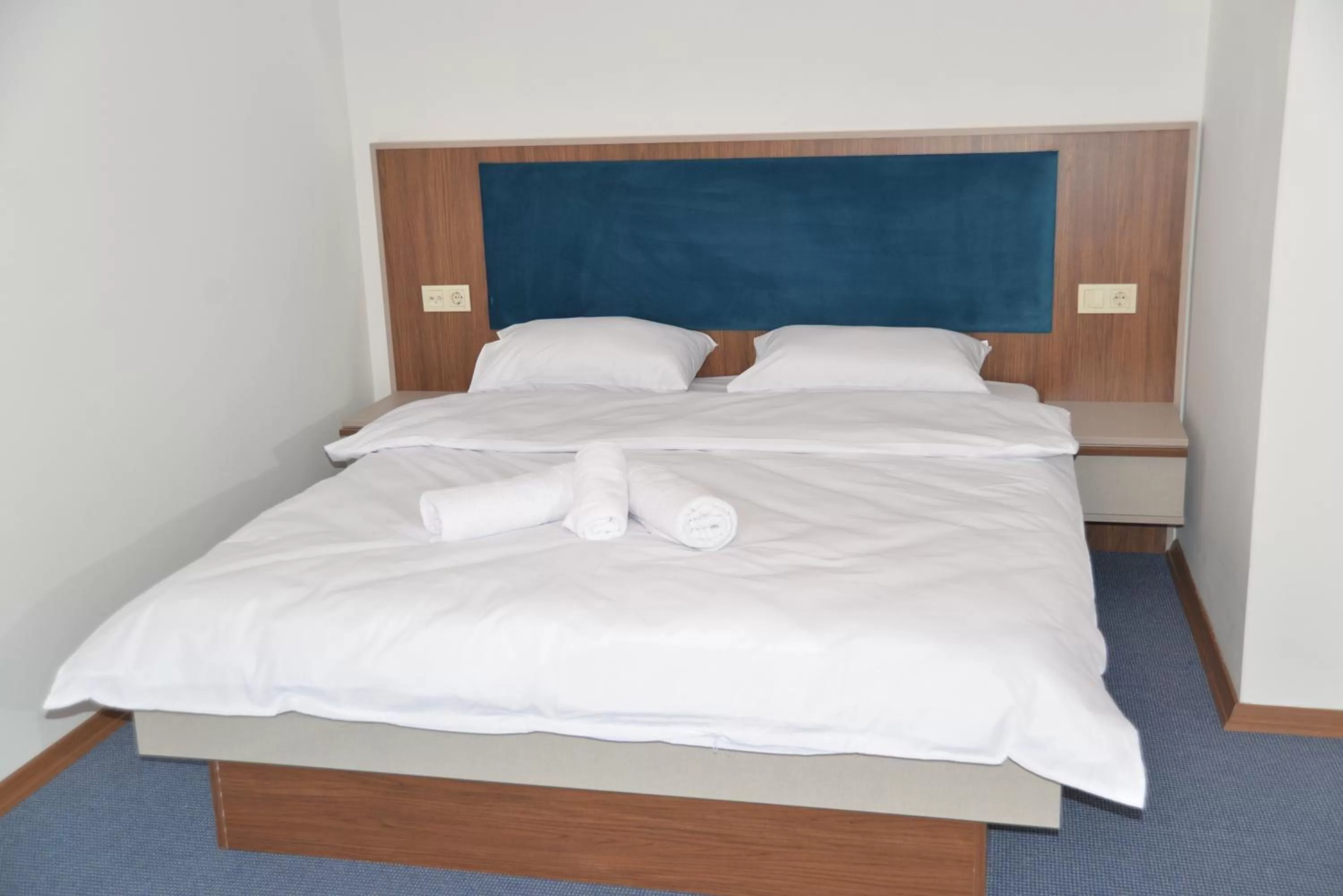 Bed in TEVETOGLU HOTEL