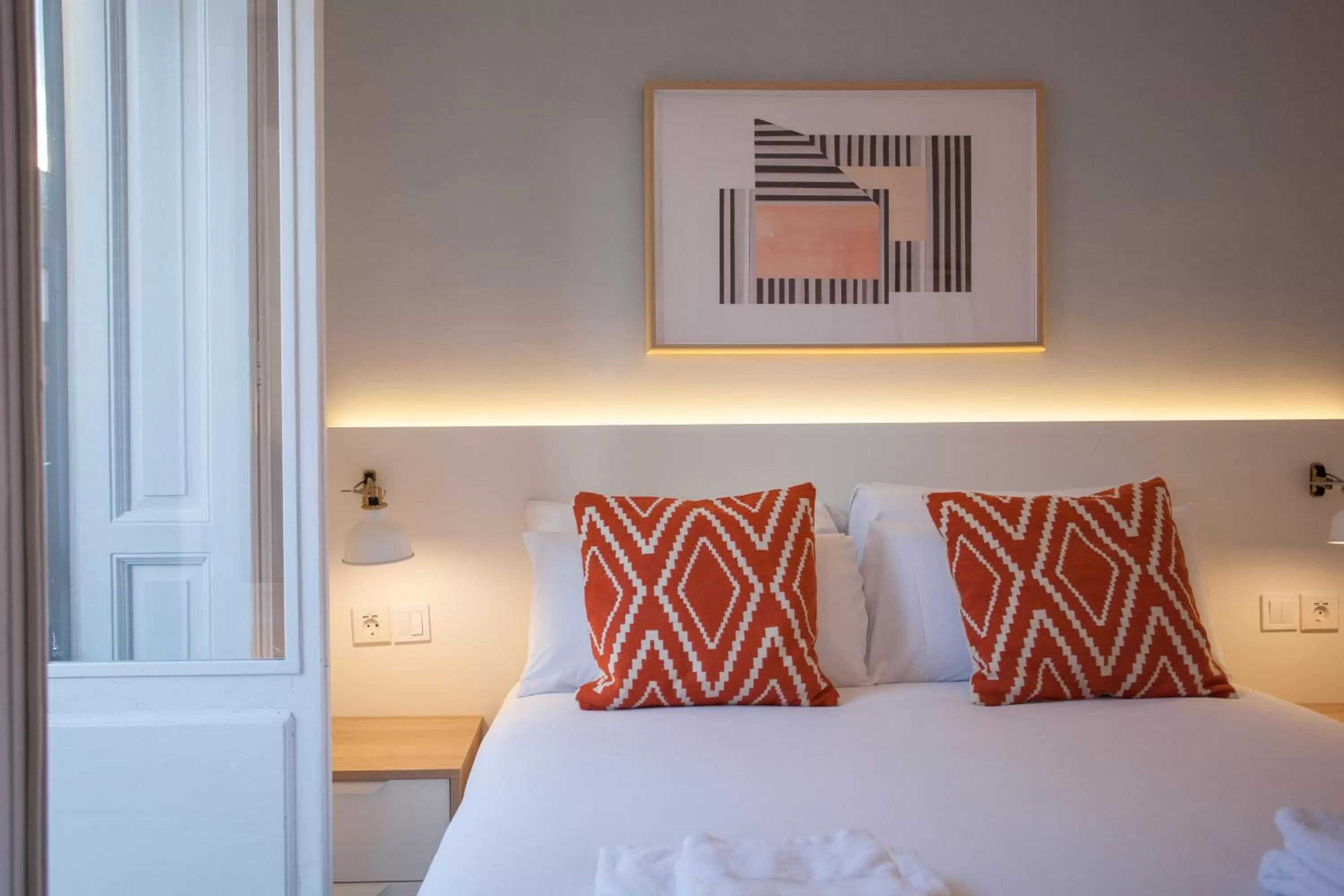 Bed in Gran Central Suites