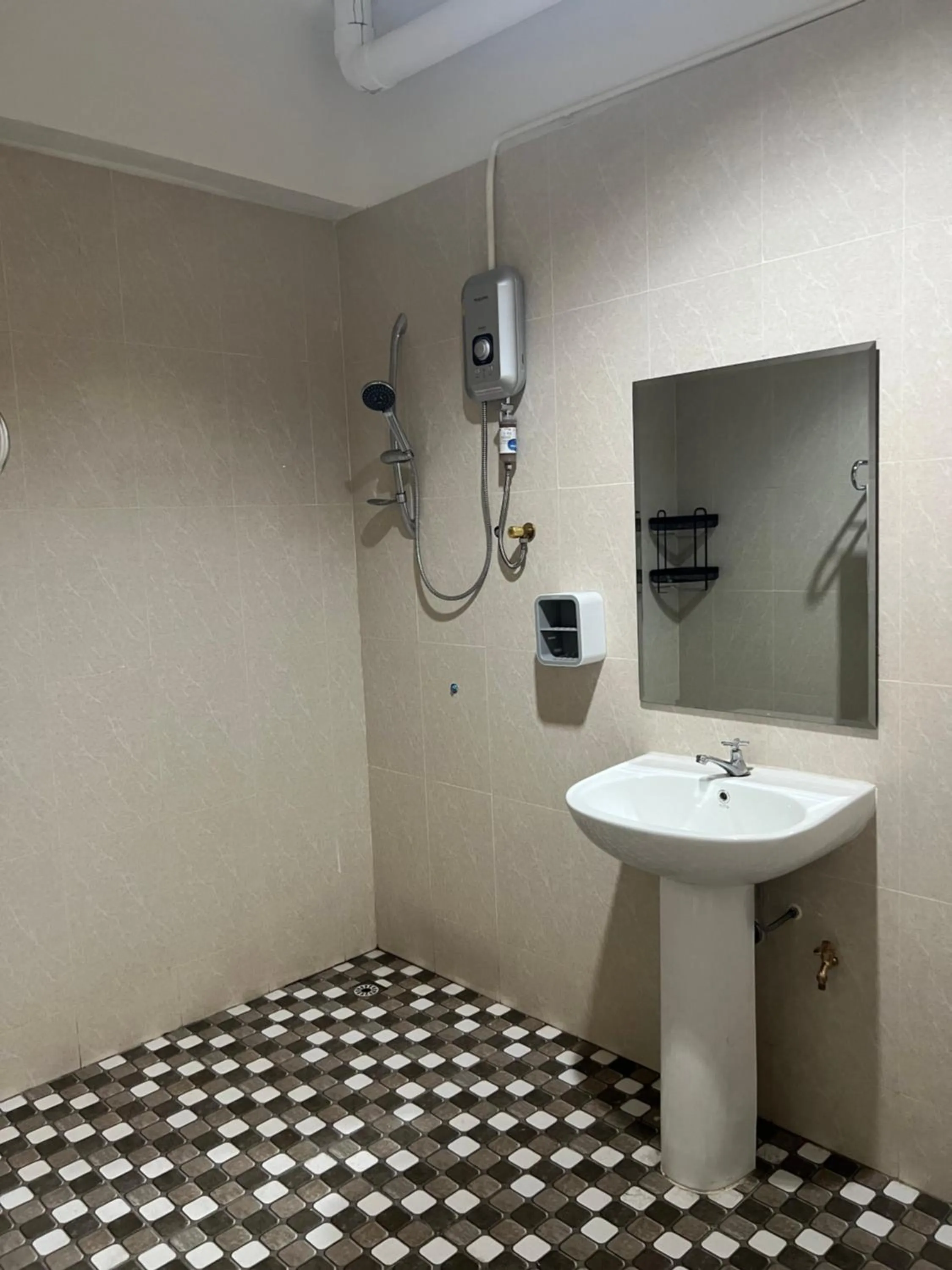 Shower in Mall Suites Hotel