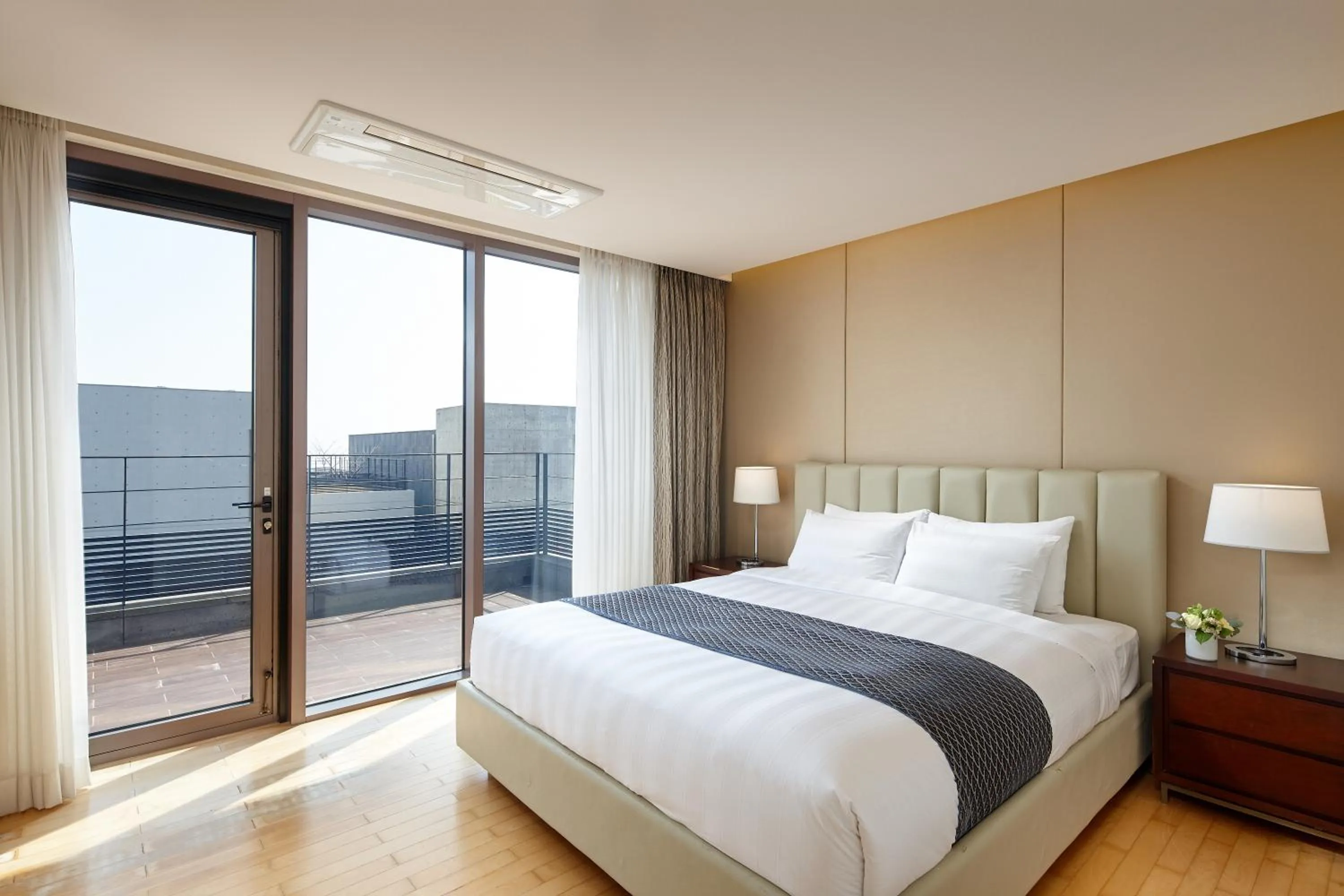 Bedroom, Bed in Lotte Resort Jeju Artvillas