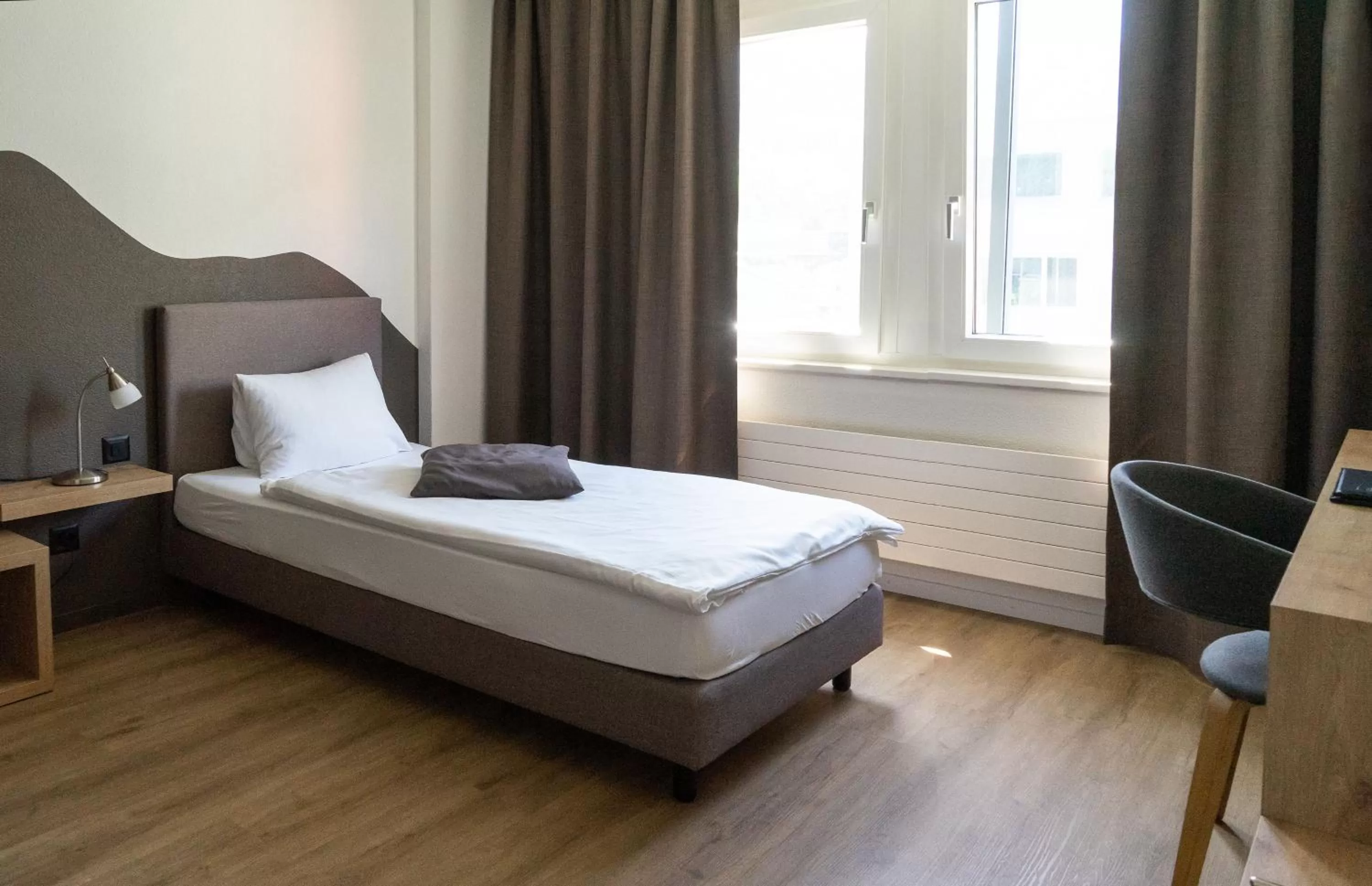 Bed in Tailormade Hotel STANS SÜD