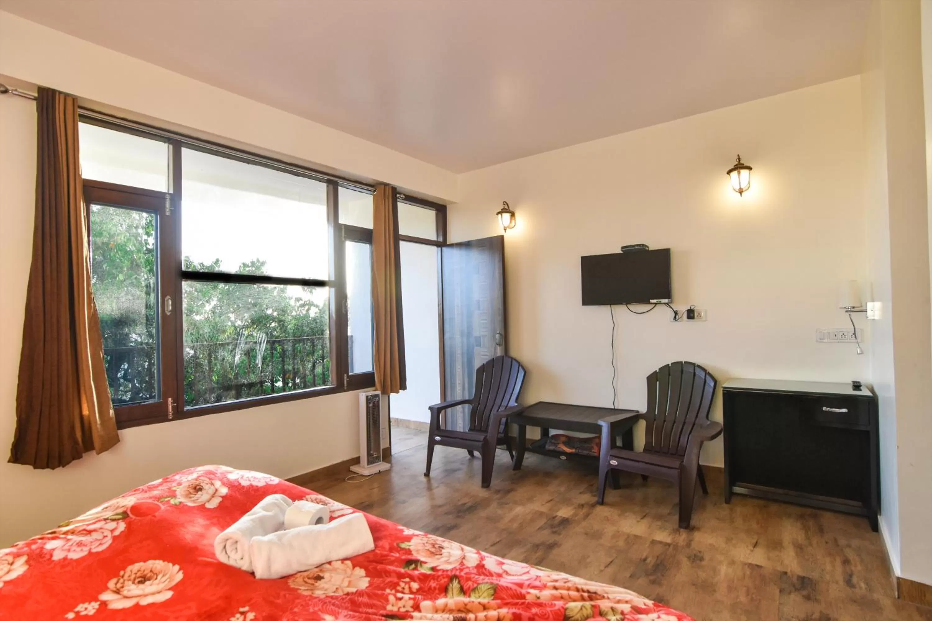 Bedroom, TV/Entertainment Center in Dhanlaxmi Apartments