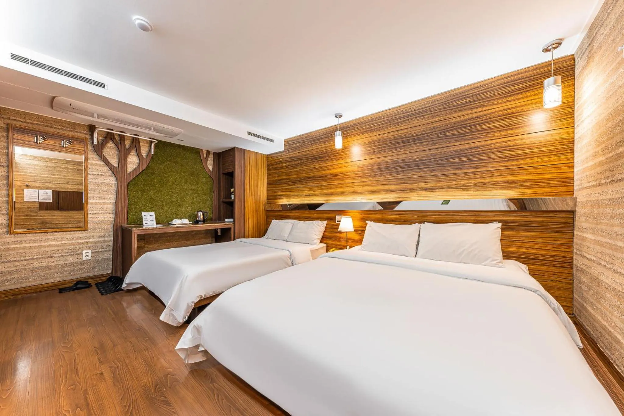 Bed in Friendly DH Naissance Hotel by Mindrum Group