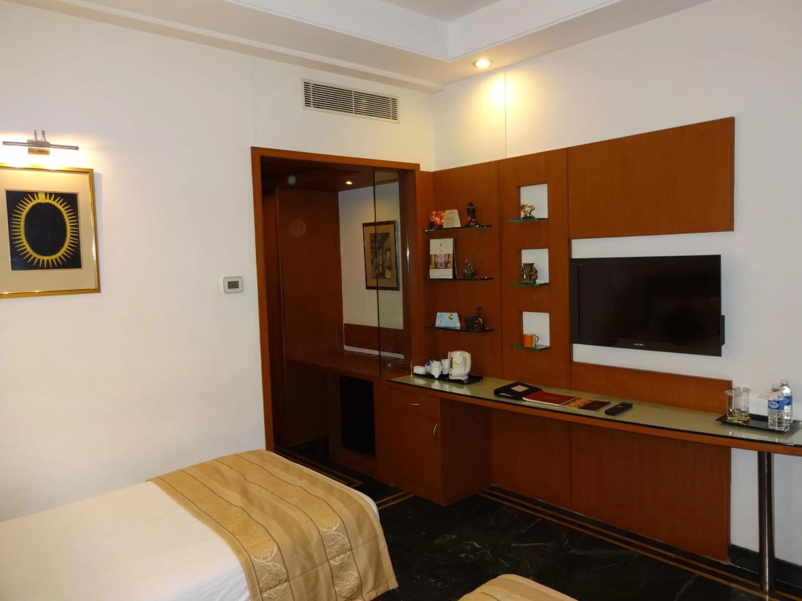 TV and multimedia, Bed in Regency Madurai by GRT Hotels