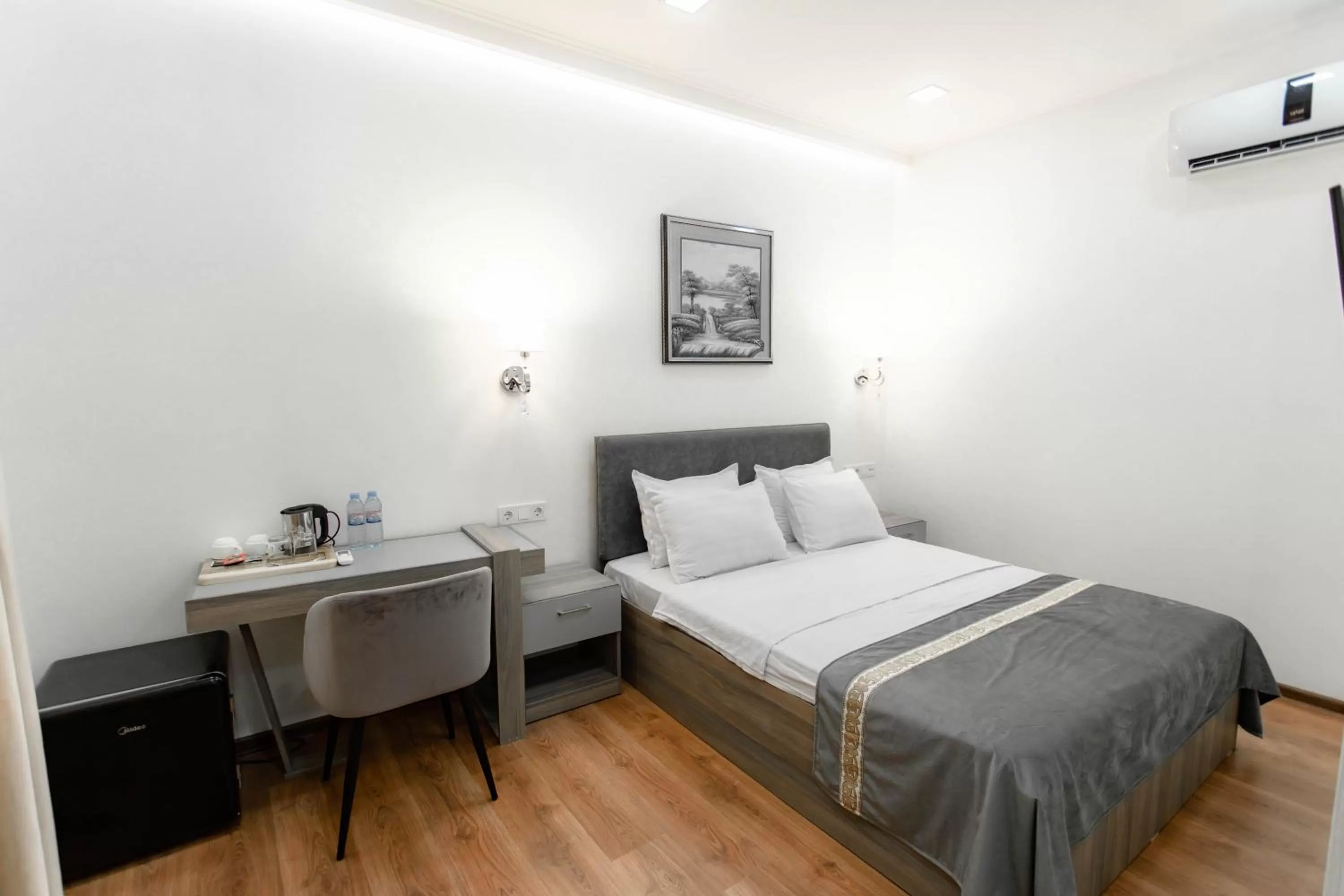 Bed in Registon Saroy Hotel