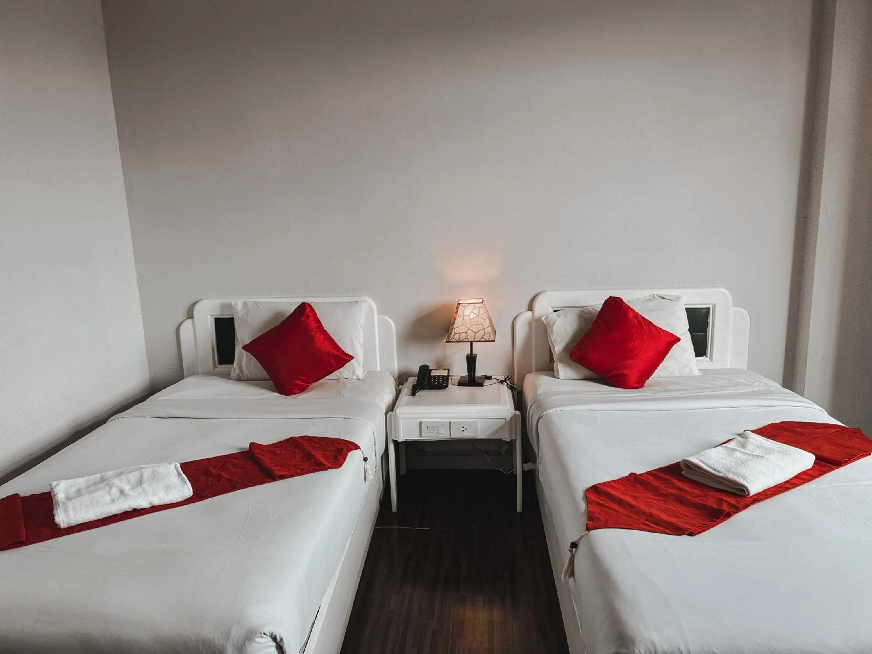 Photo of the whole room, Bed in River Grand Hotel