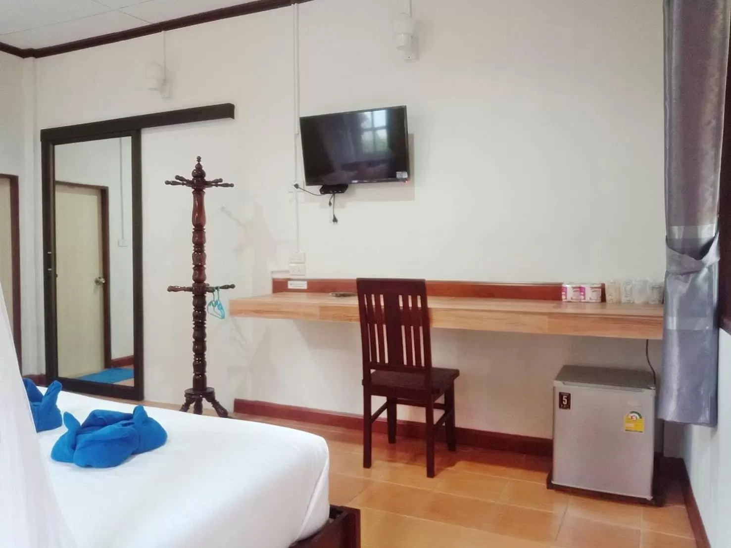 Bed in Tree Tops River Huts