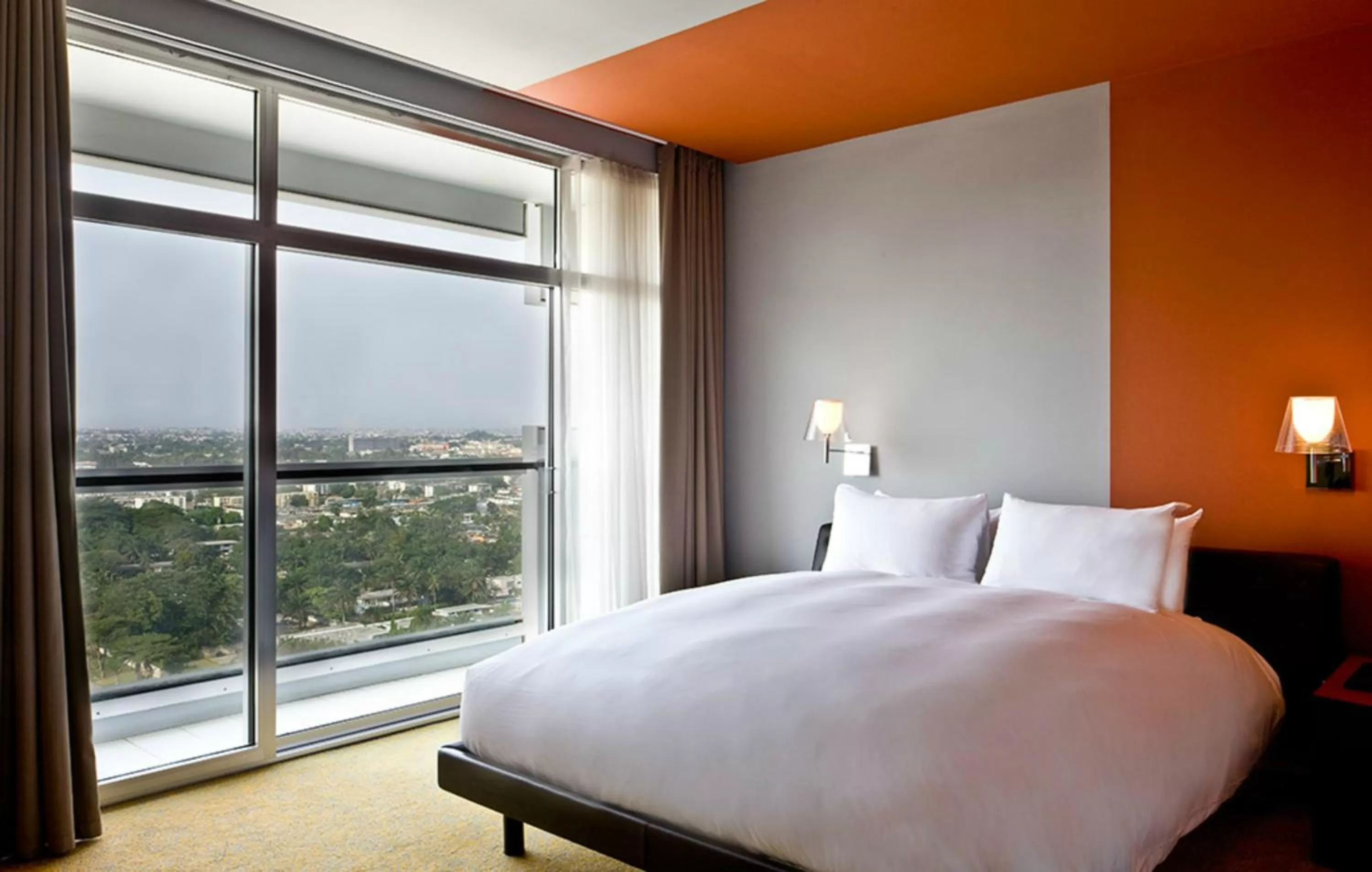 Photo of the whole room, Bed in Sofitel Abidjan Hotel Ivoire