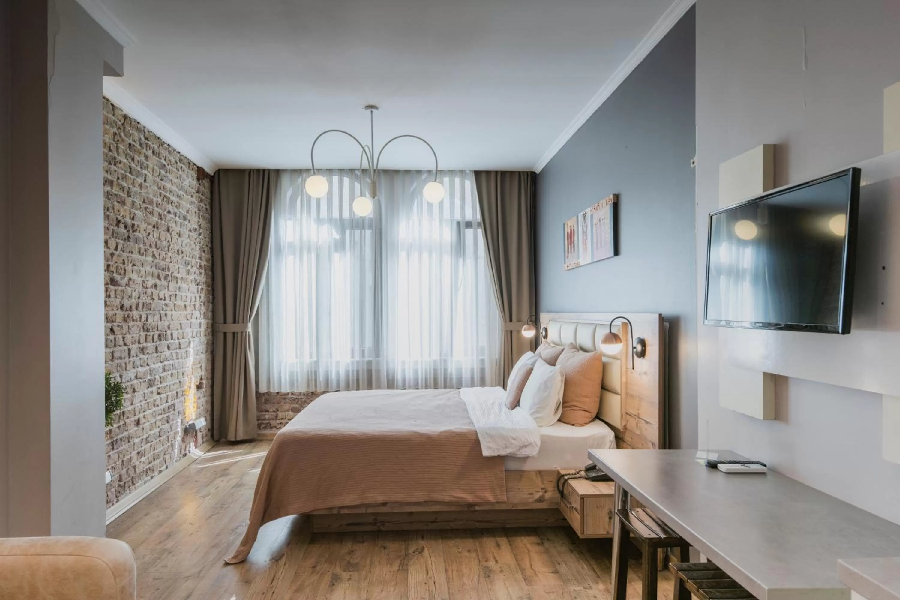 Bed in The Wilson Galata Hotel