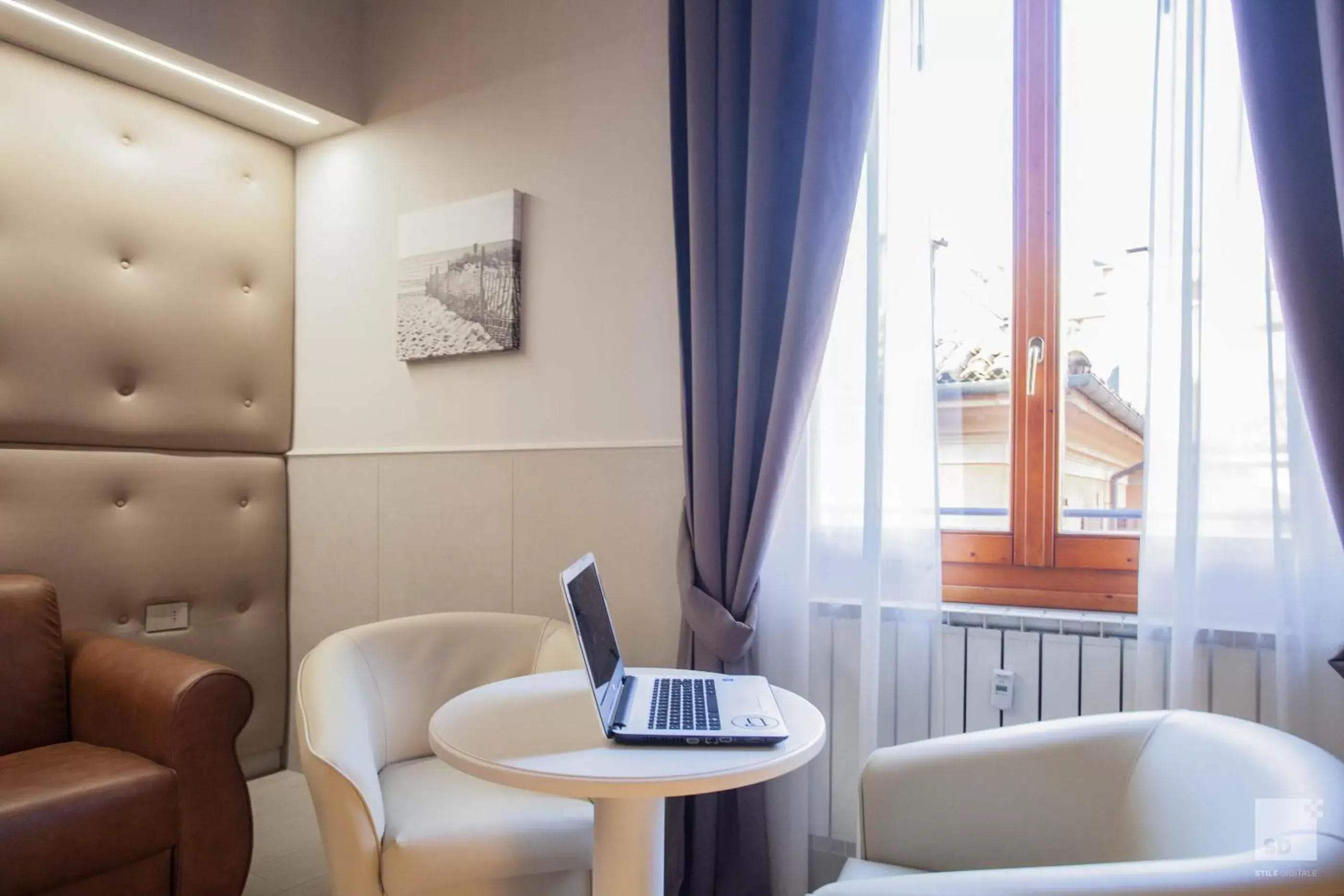 Quadruple Room in Hotel Cavour Quadruple Room in Hotel Cavour