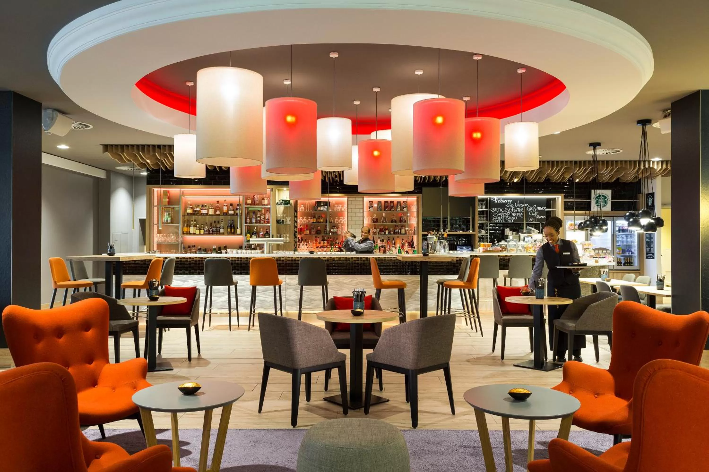 Lounge or bar in Holiday Inn Munich City Centre by IHG
