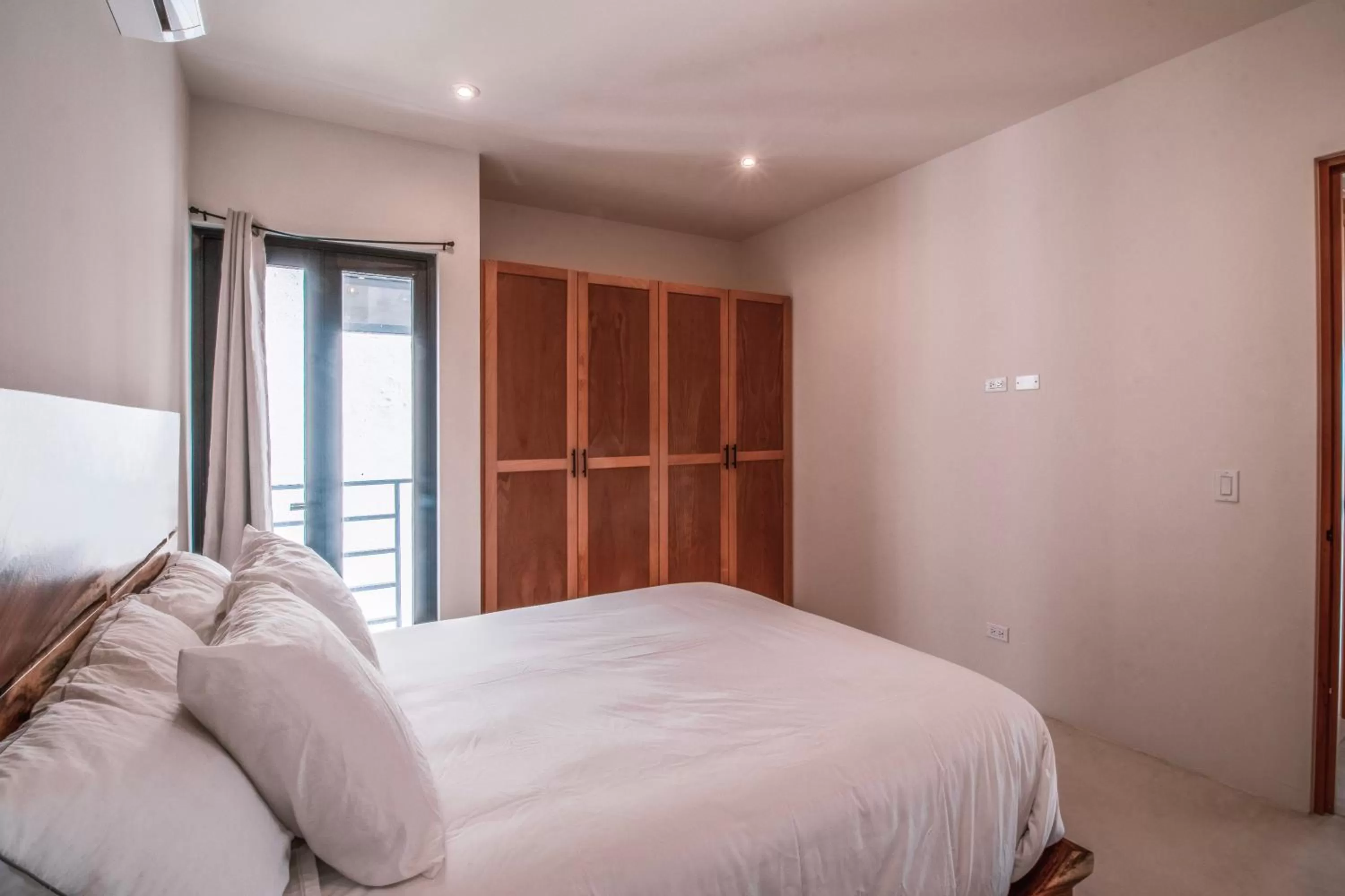 Bed in Cerritos Surf Residences