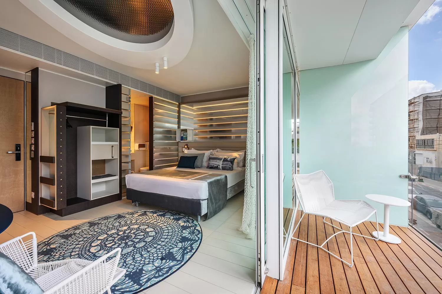 Photo of the whole room, Bed in Port Tower by Isrotel Design